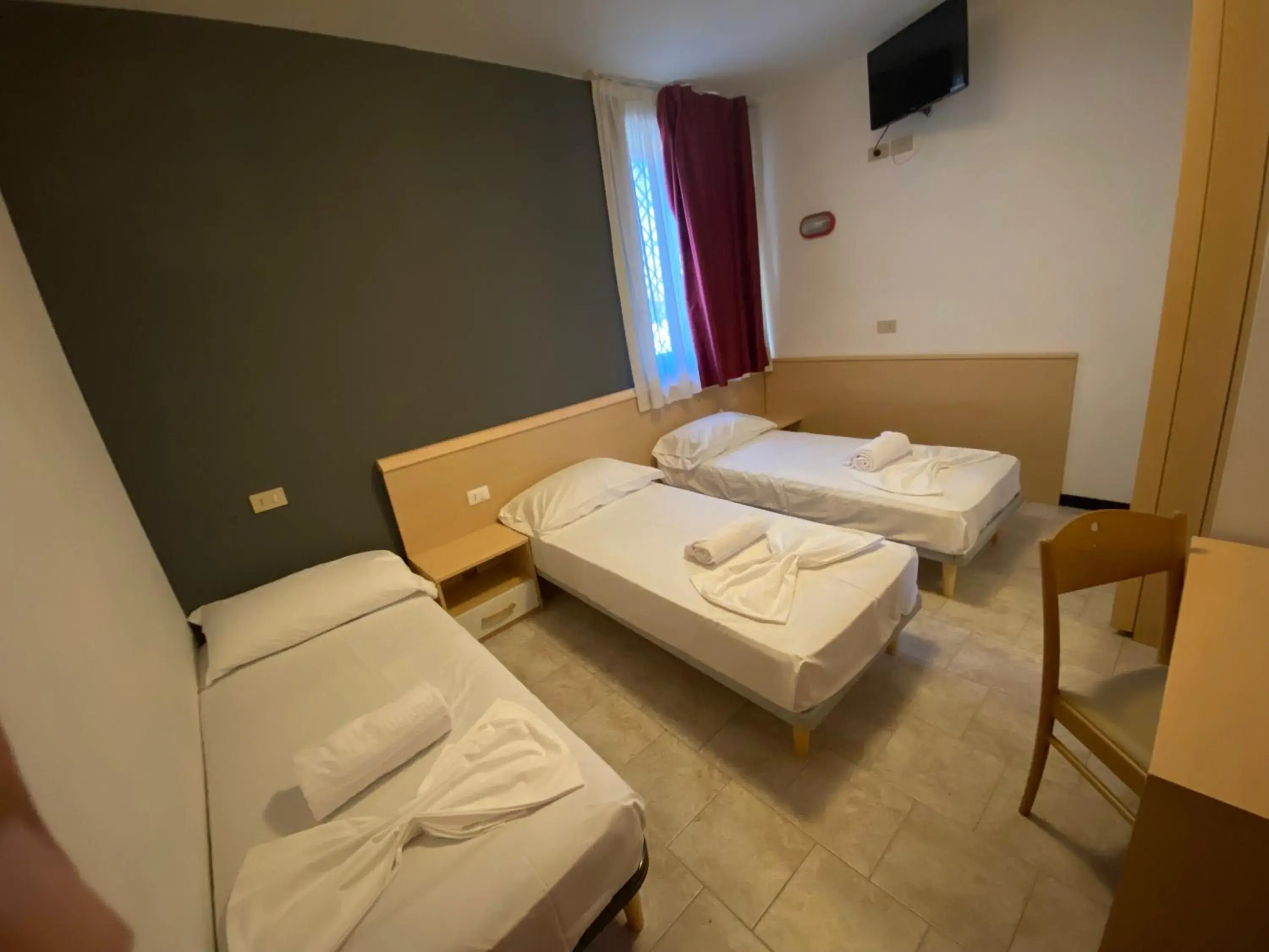 Classic Triple Room in Hotel Mazzini Classic Triple Room in Hotel Mazzini