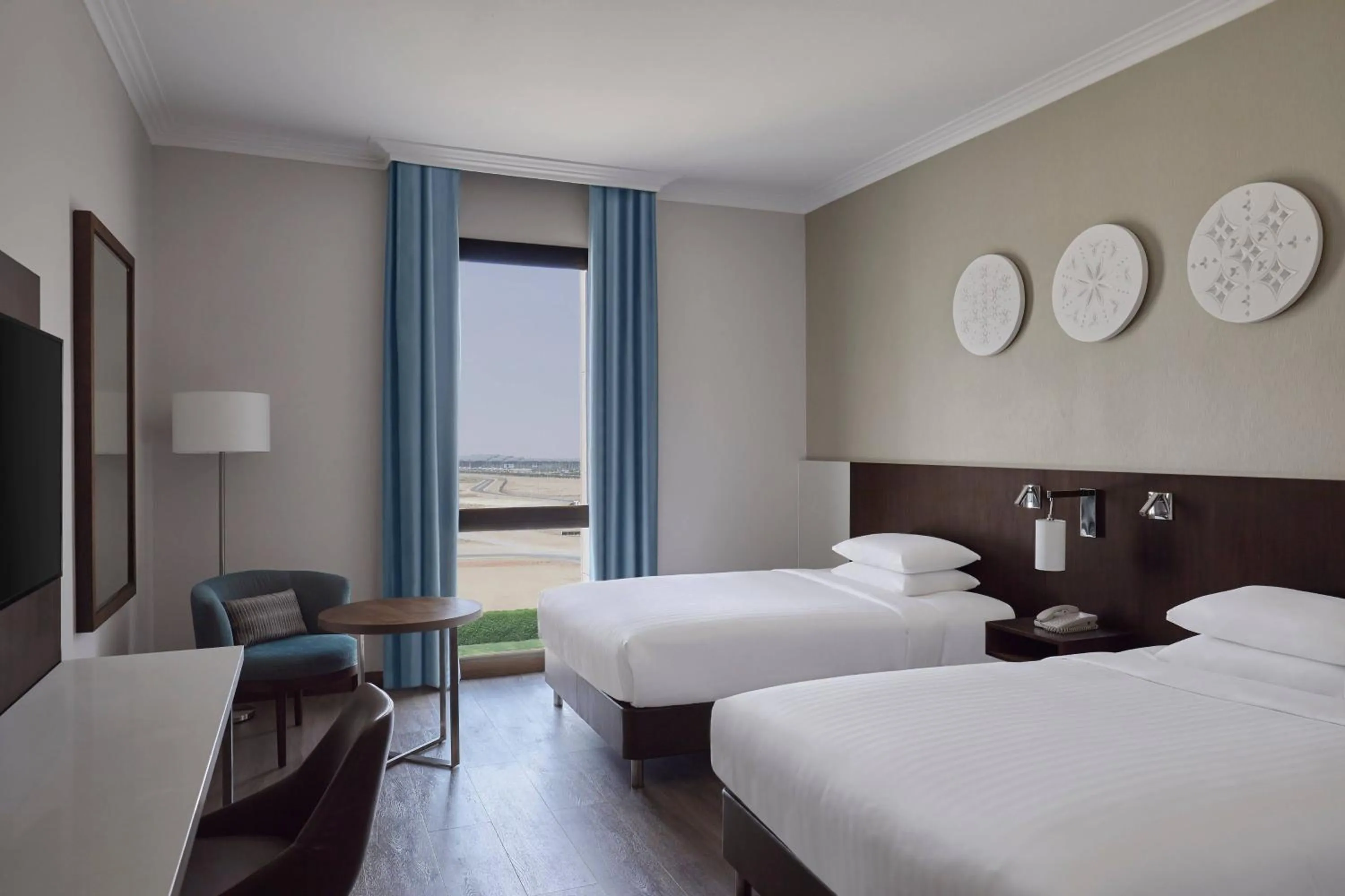 Photo of the whole room, Bed in Riyadh Airport Marriott Hotel