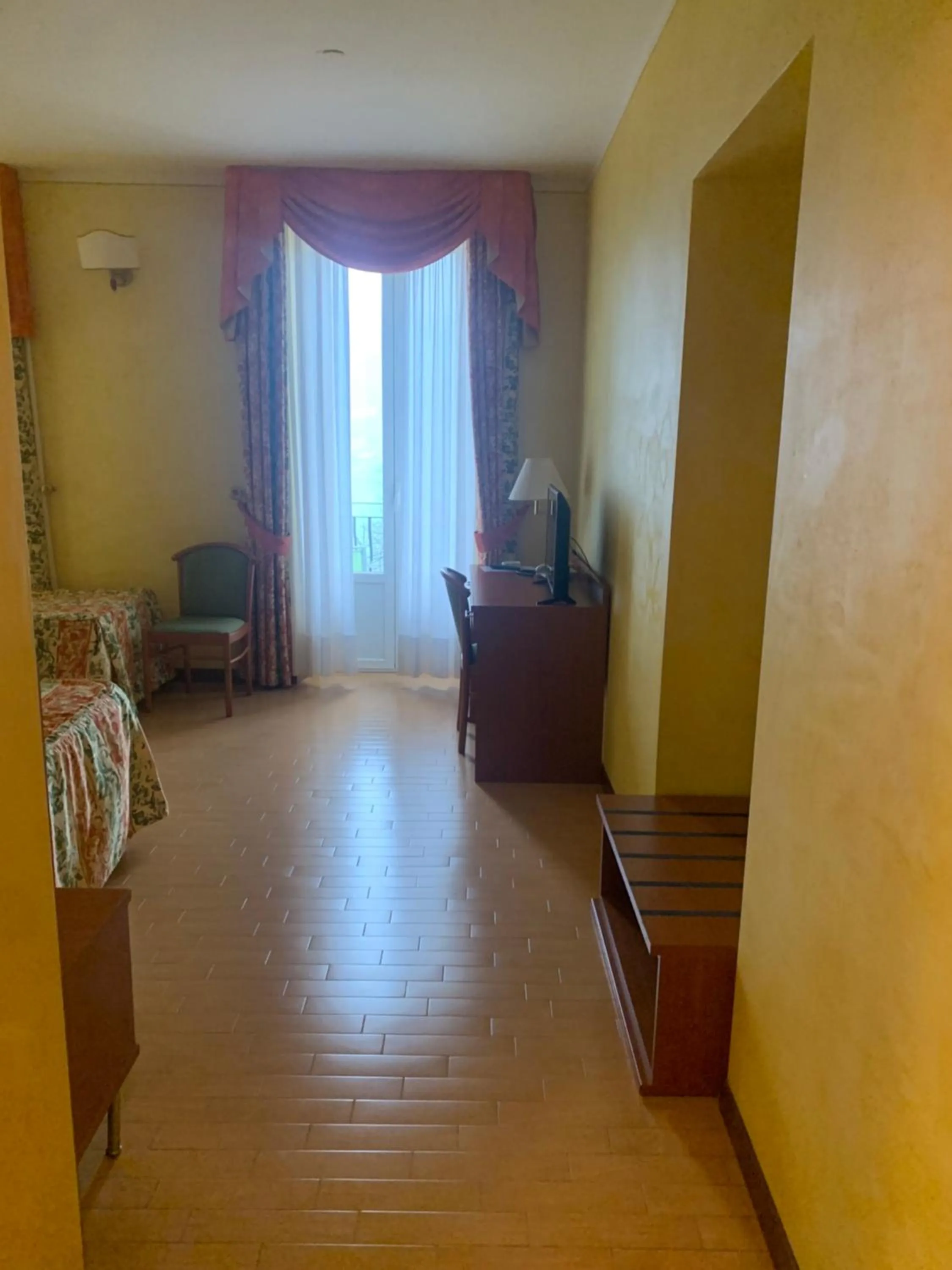 Bedroom in Hotel La Bussola