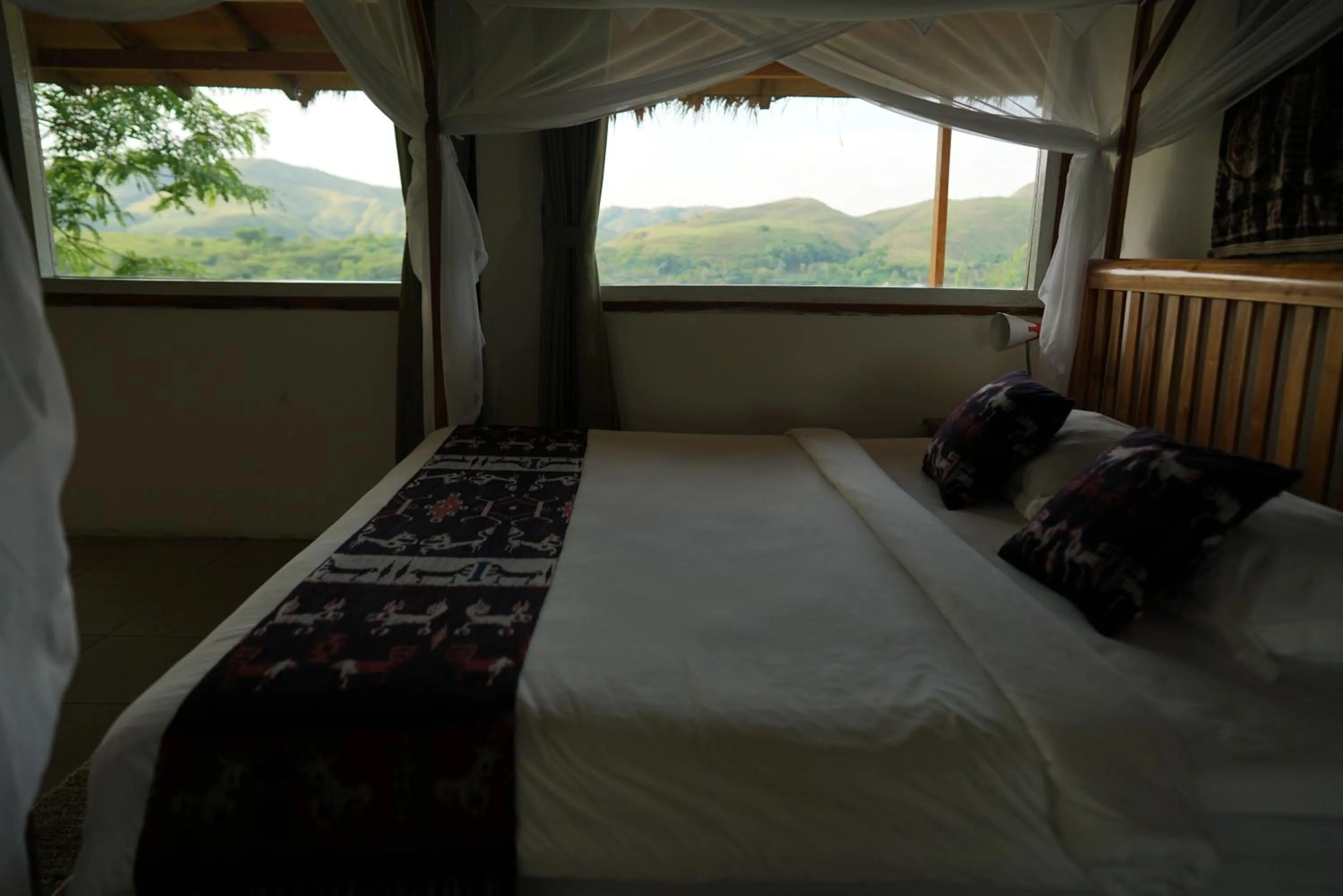 Bed in Morinda Villa and Resto