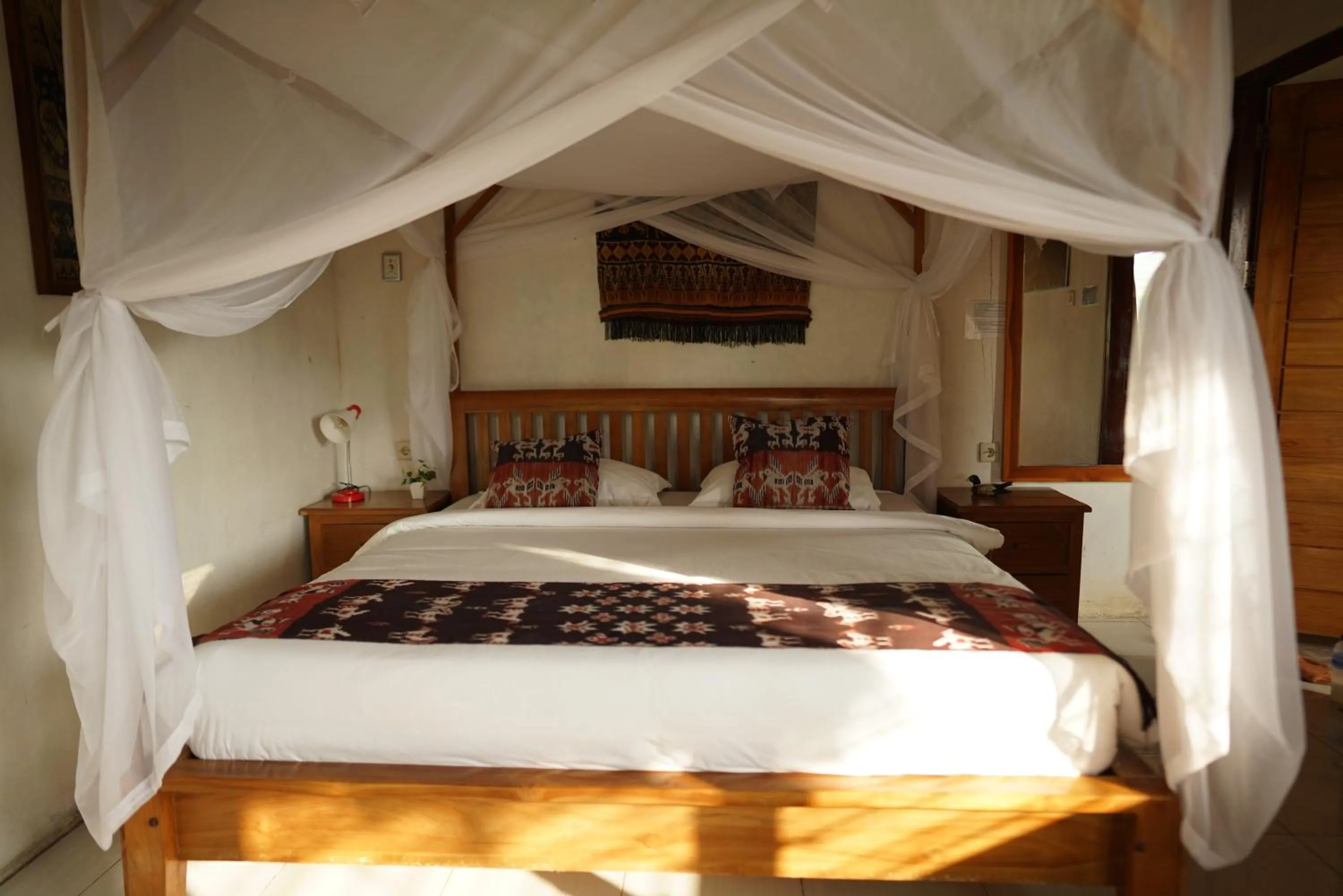 Bed in Morinda Villa and Resto