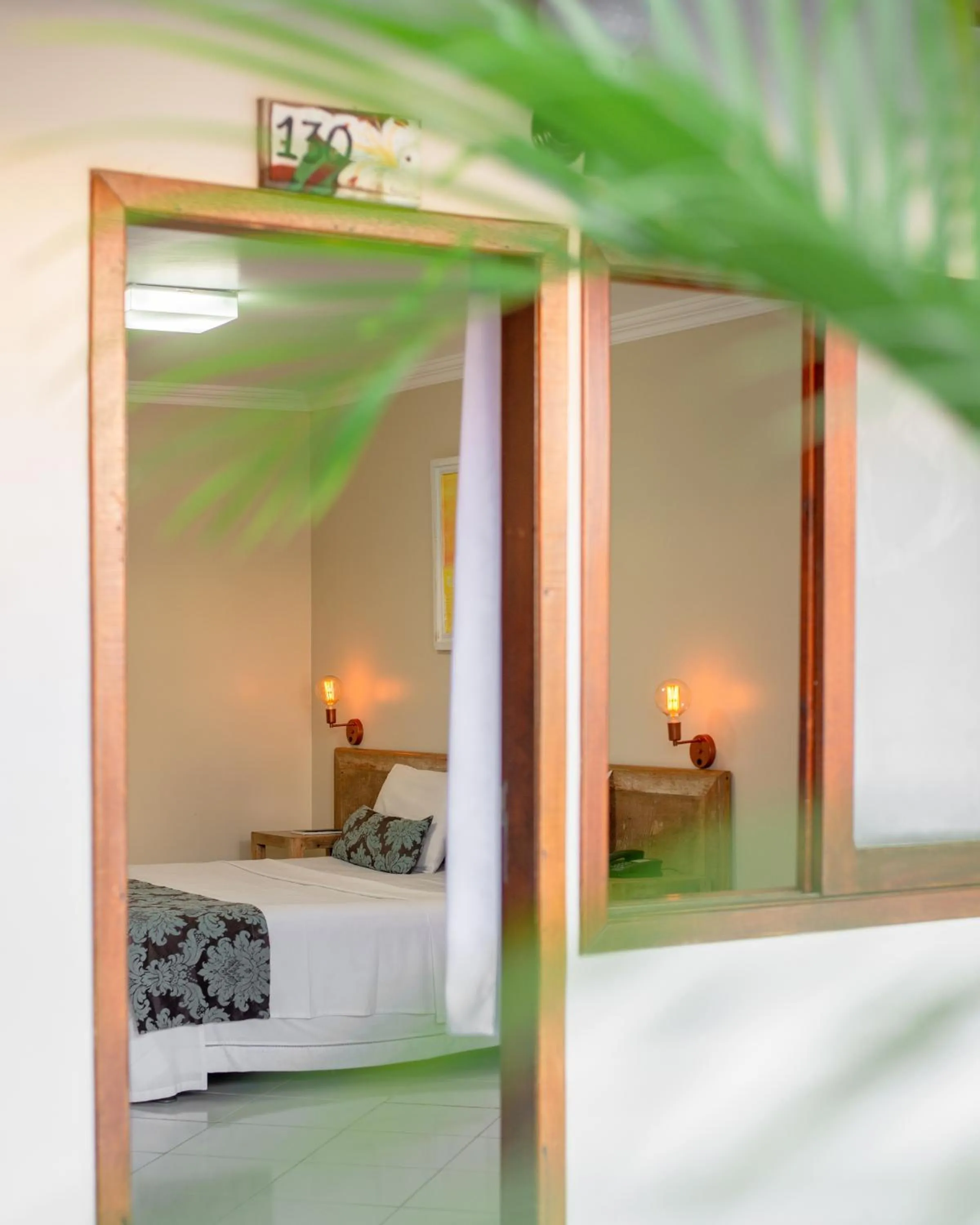 Bed in Hotel Don Quijote Búzios