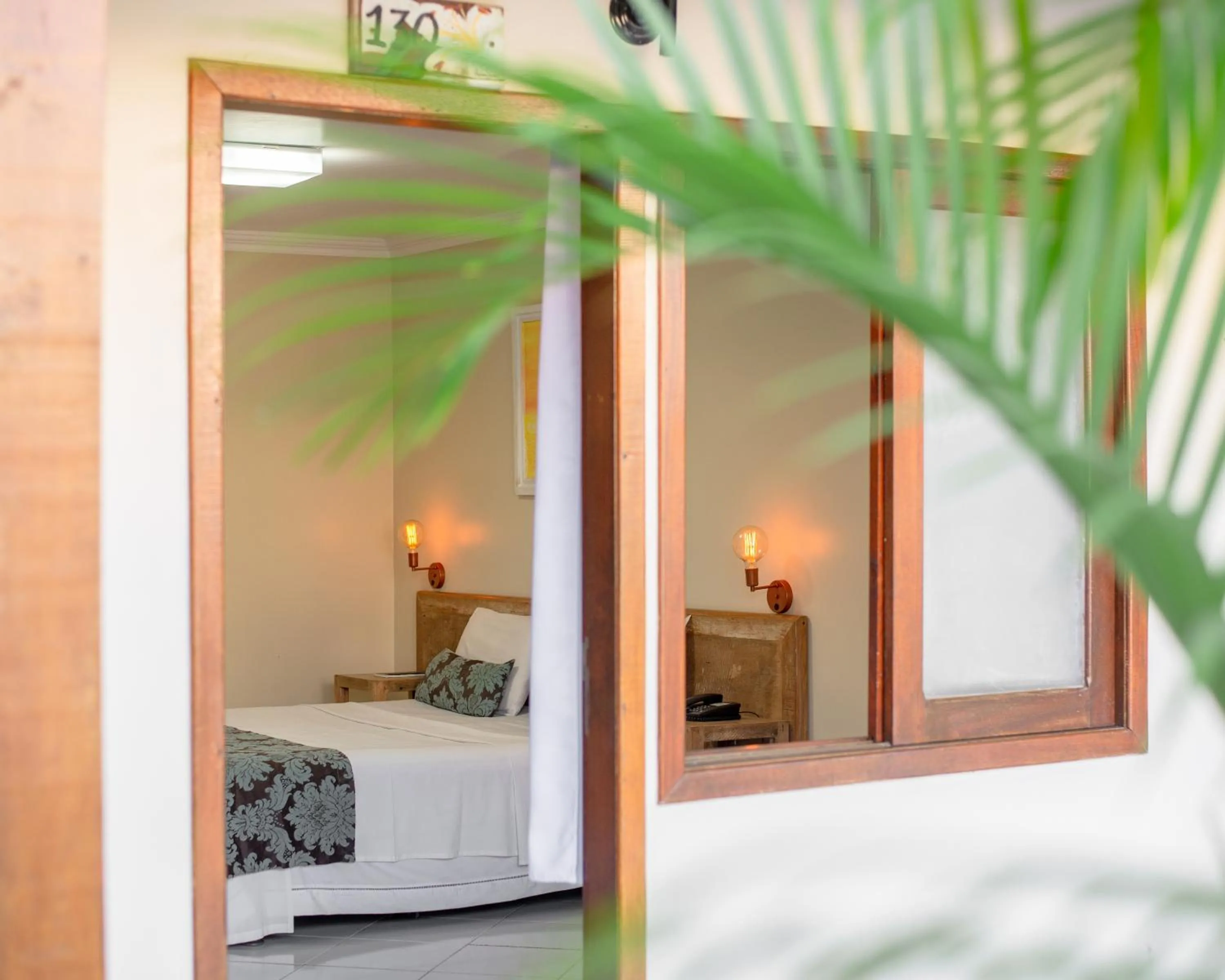 Bed in Hotel Don Quijote Búzios