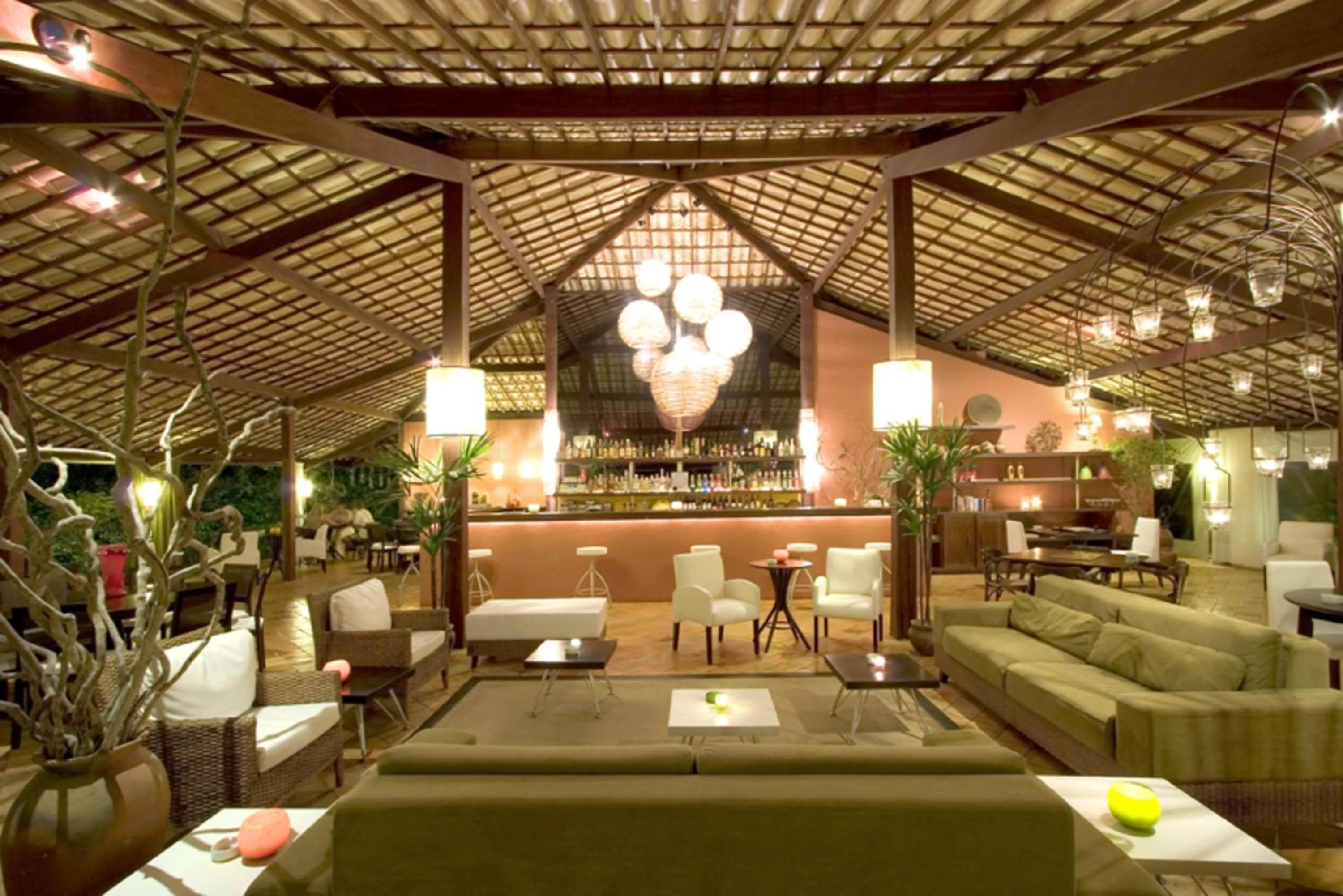 Communal lounge/ TV room in Girassóis Suítes