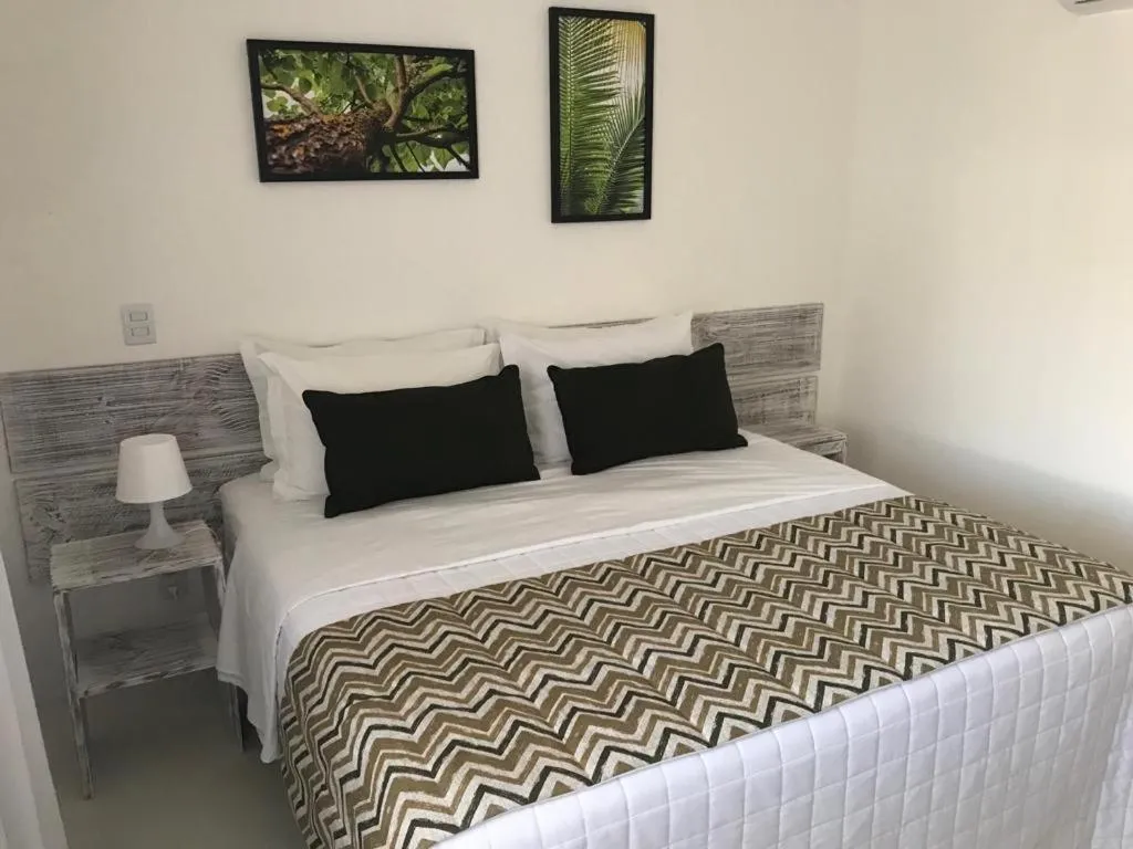 Bed in Girassóis Suítes