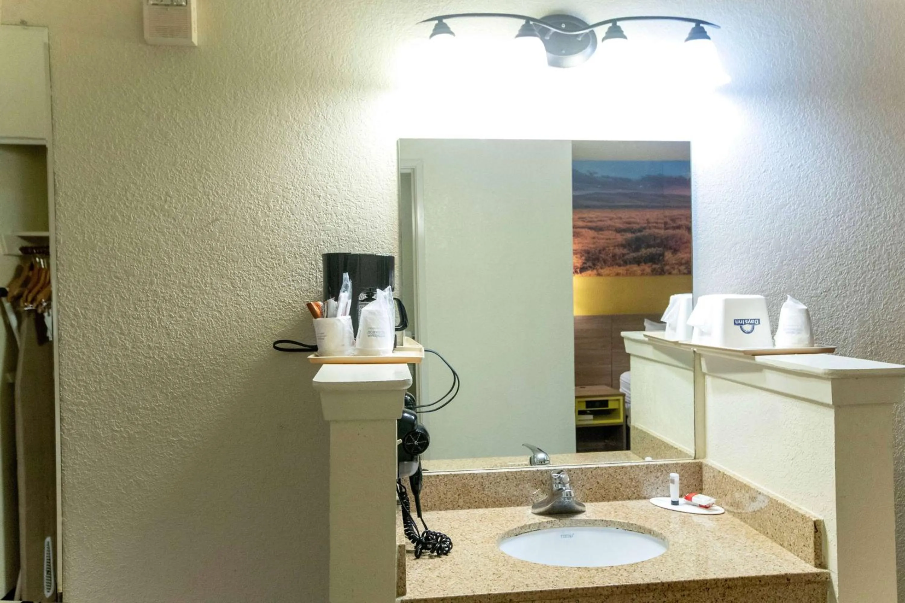 Bathroom in Days Inn & Suites by Wyndham Houston North/Aldine