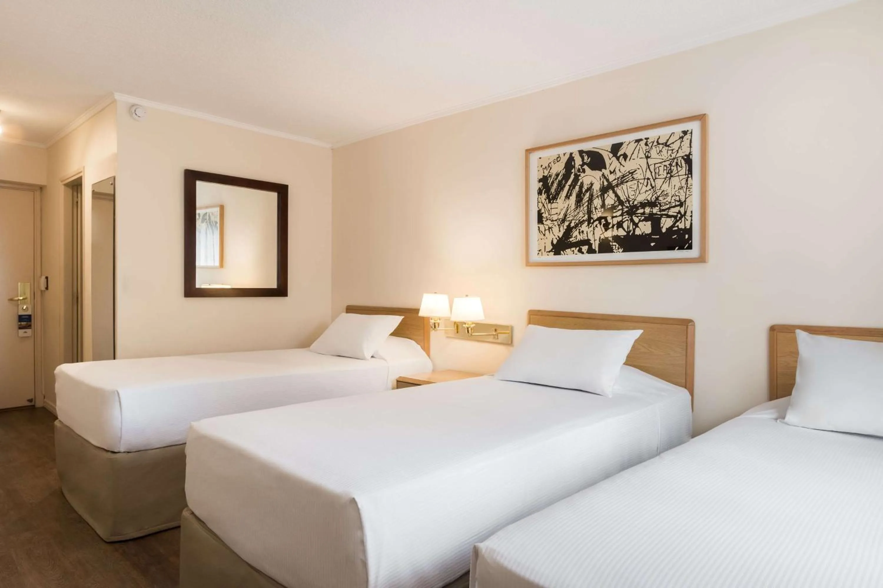 Photo of the whole room, Bed in Alfa Suites - Montevideo