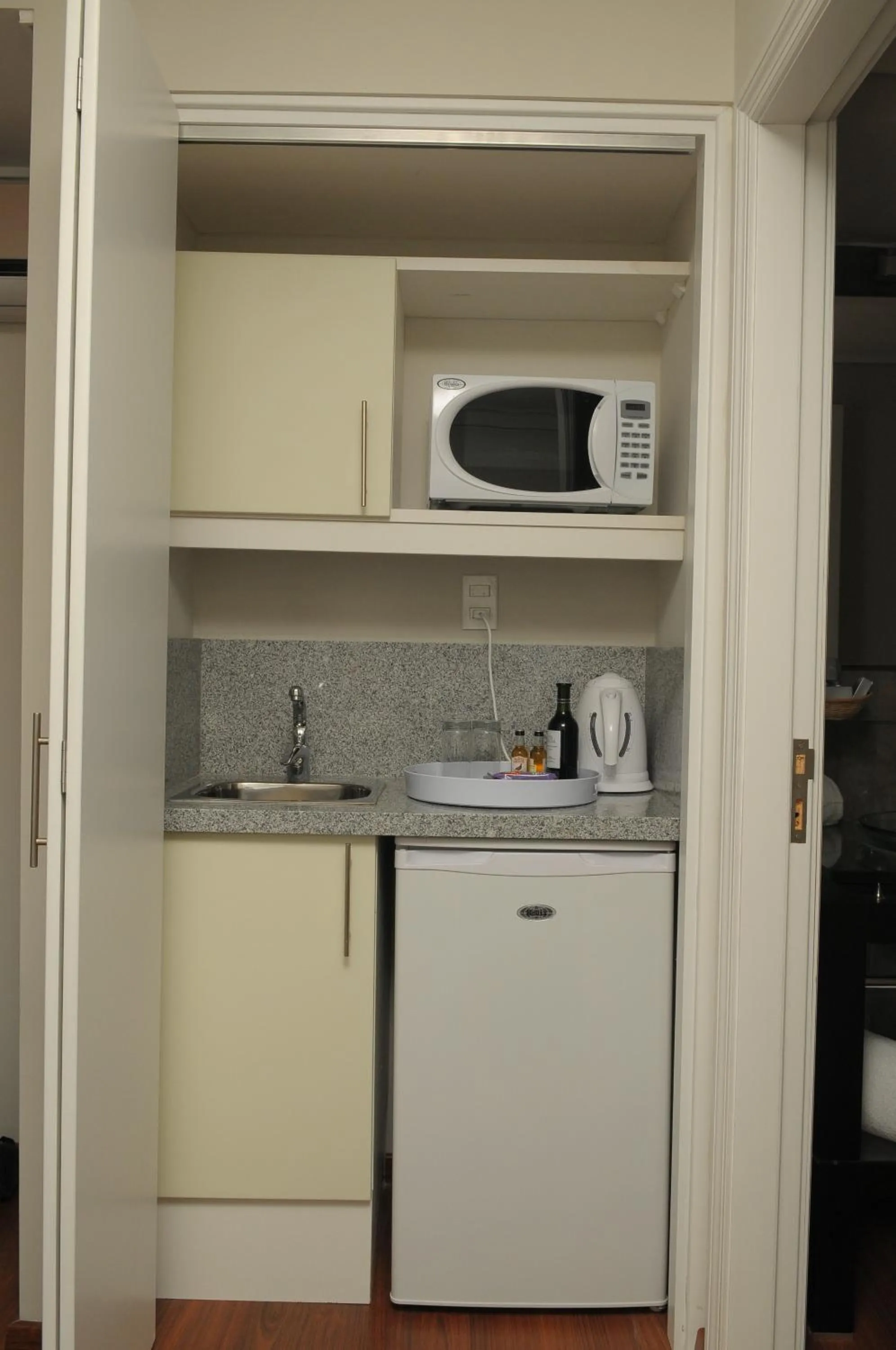Kitchen or kitchenette in Regency Golf - Hotel Urbano