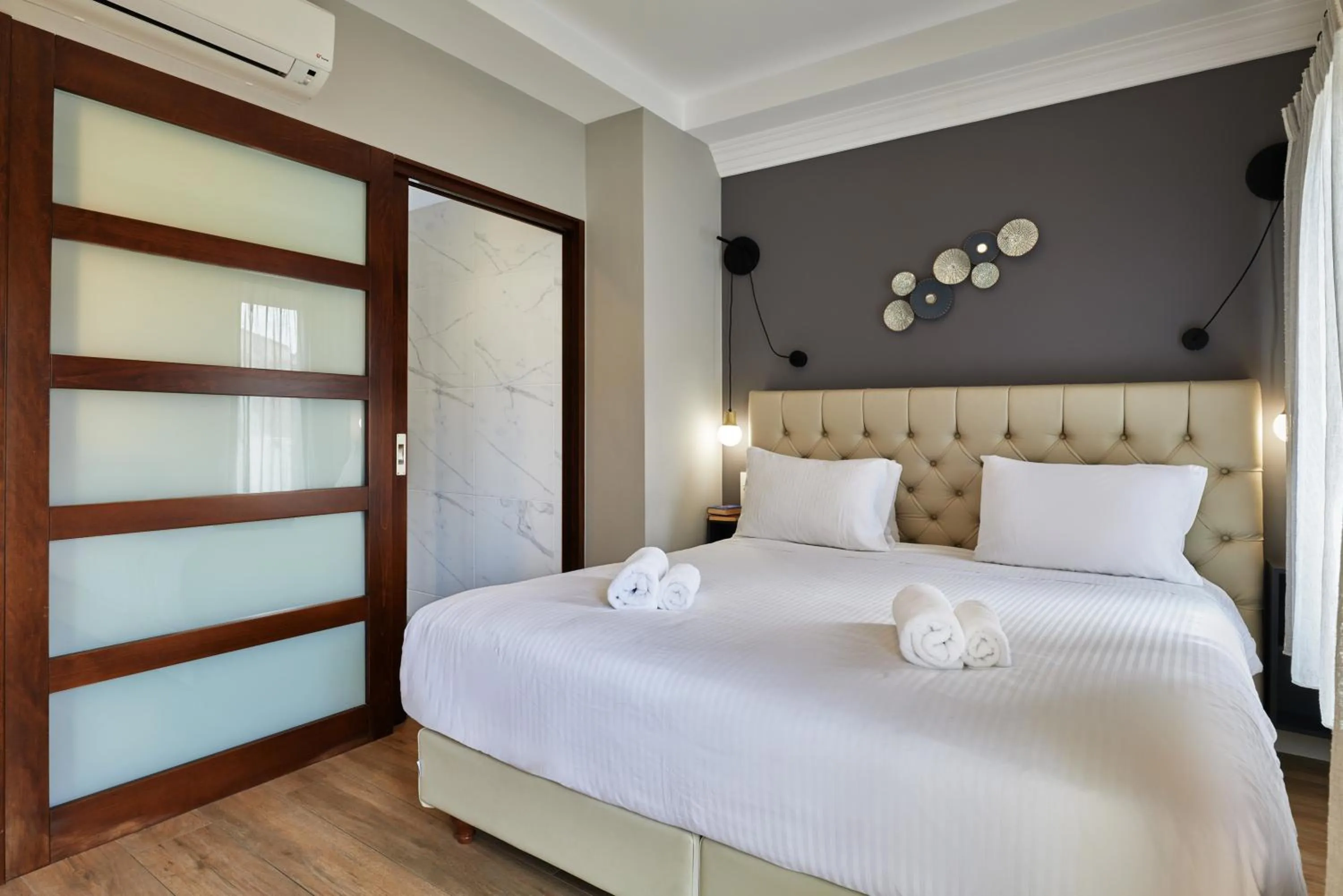 Bed in Nival Luxury Suites