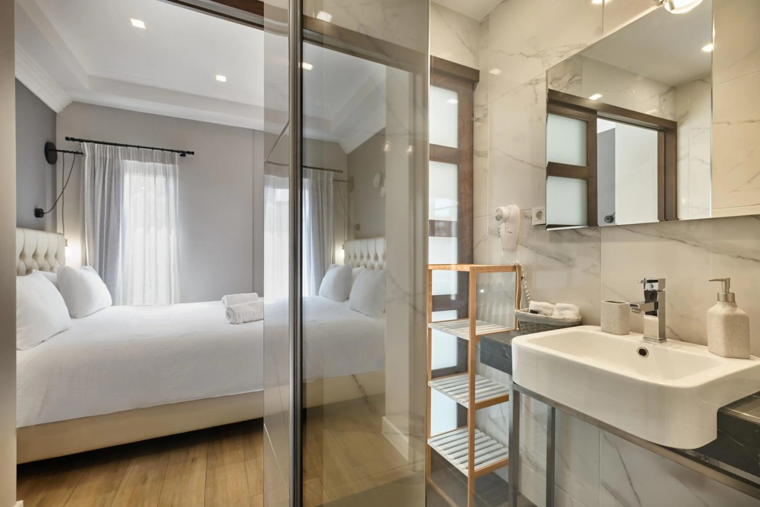 Bed in Nival Luxury Suites