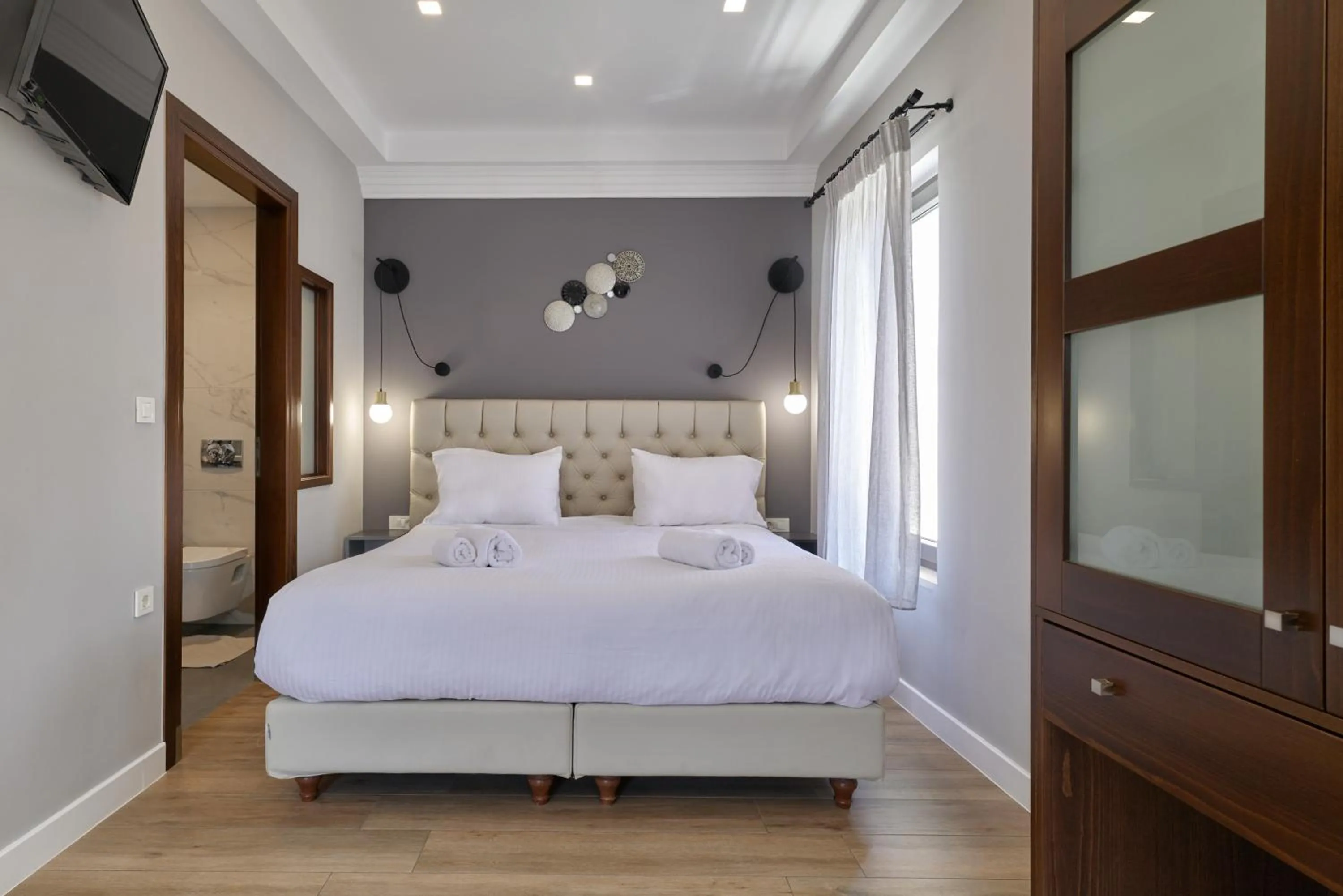 Bed in Nival Luxury Suites