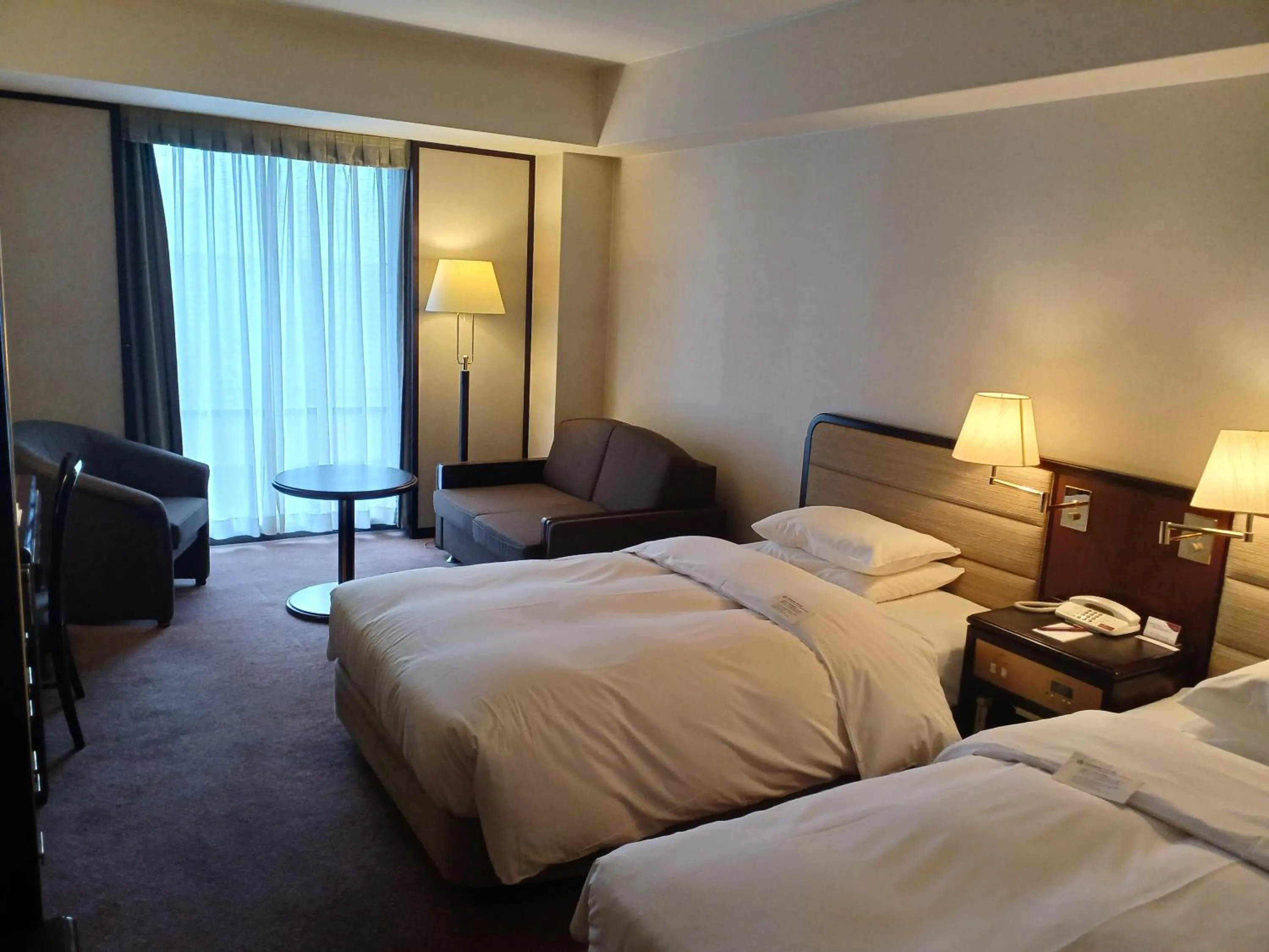 Bed in ANA Crowne Plaza Hotel Kyoto by IHG