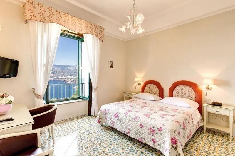 Bed in Hotel La Badia