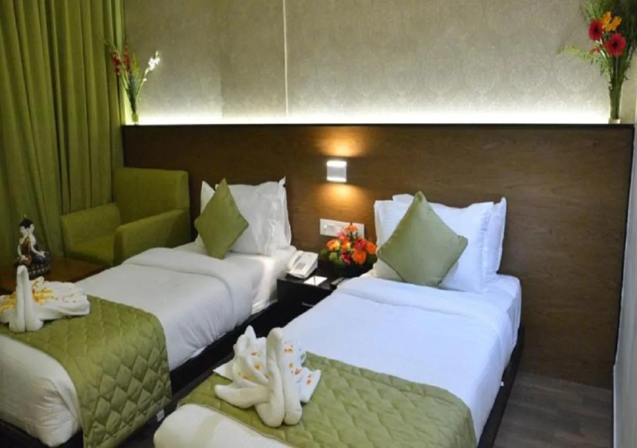 Bed in Hotel Sree Annamalaiyar Park