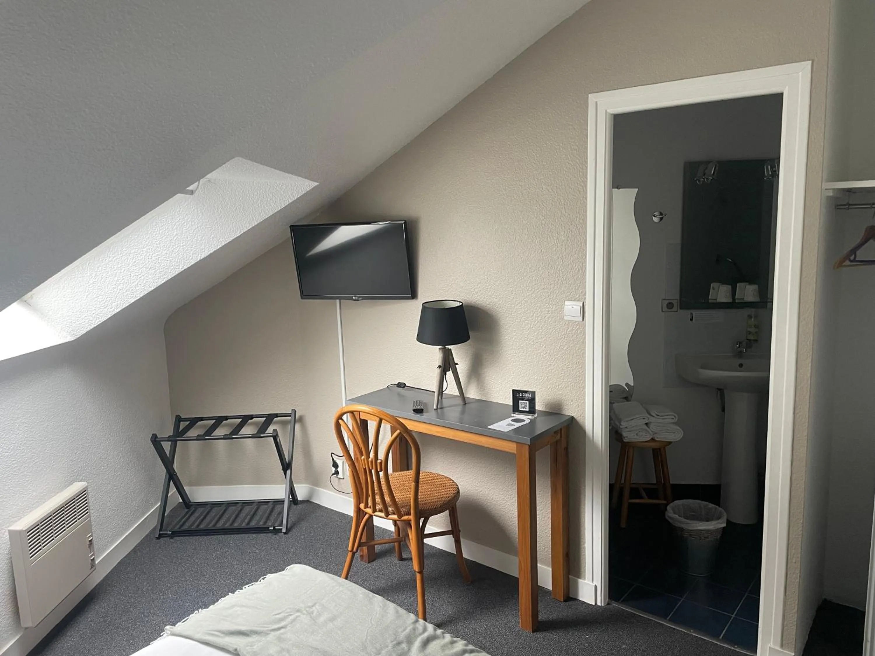 Bed in Hotel La Licorne