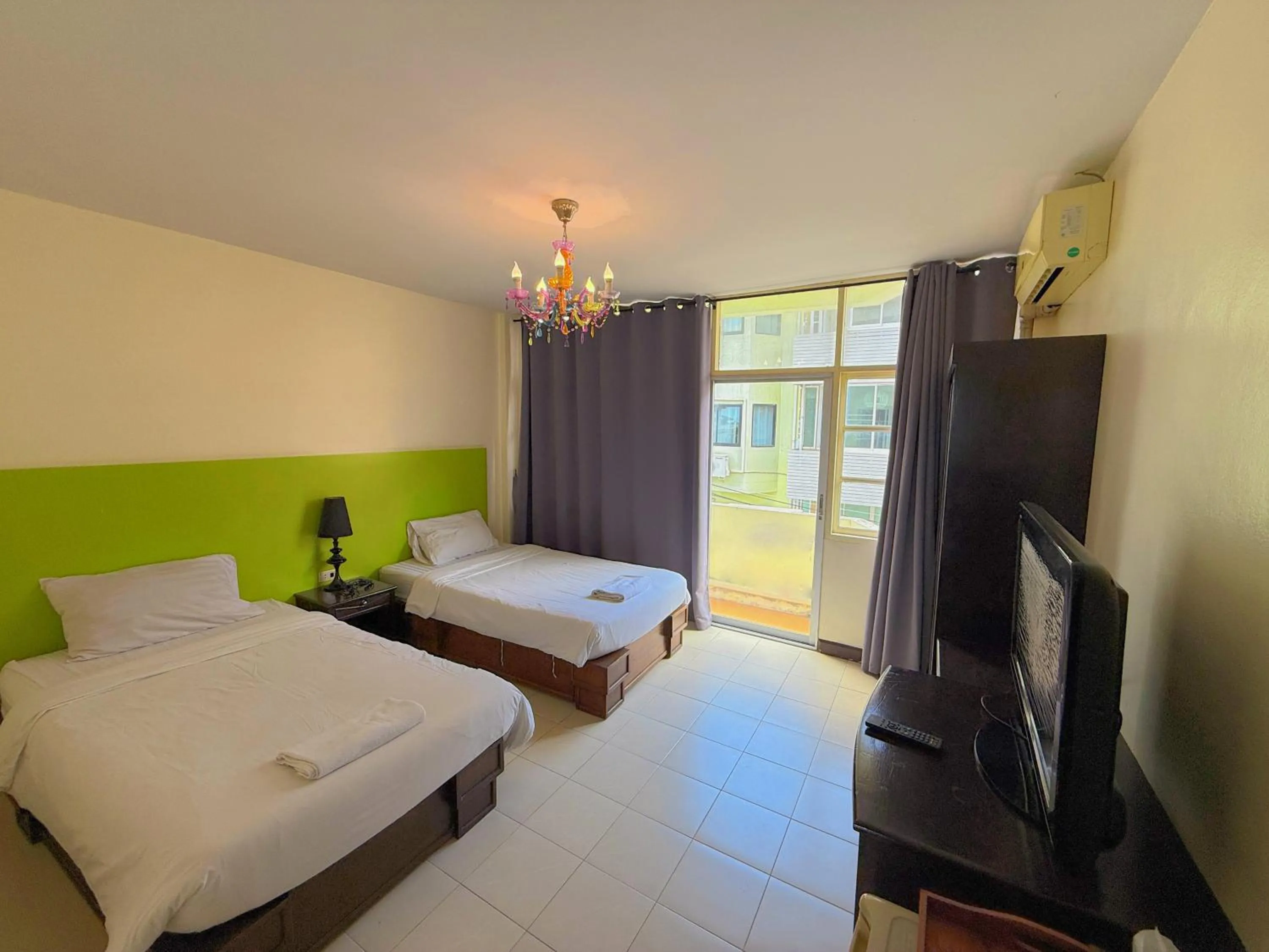 Bed in Baan Nilawan Hotel