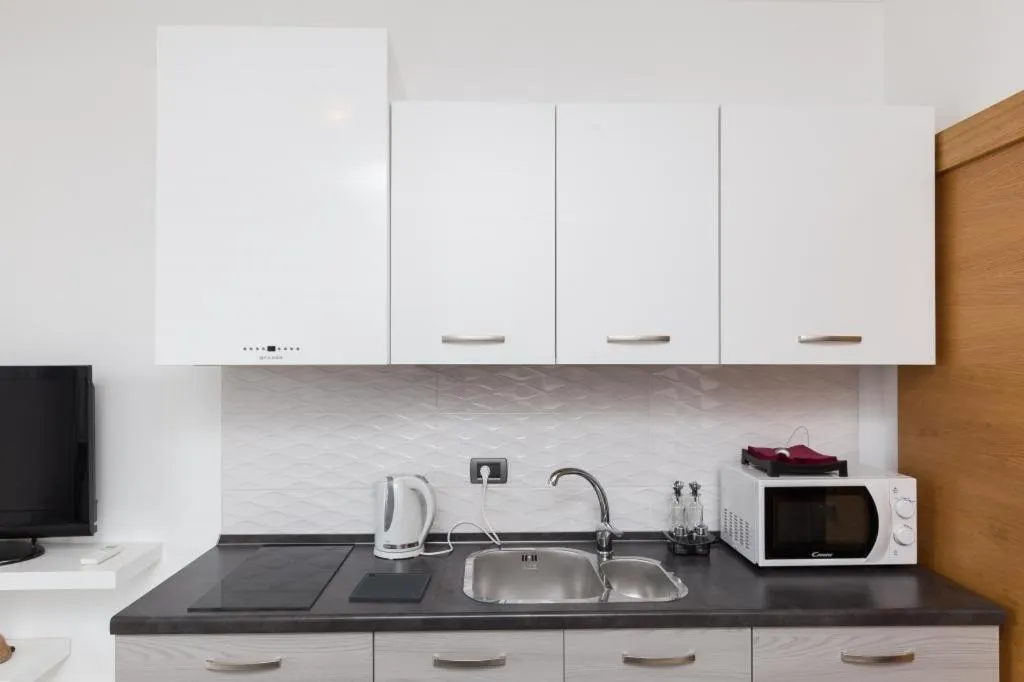 Kitchen or kitchenette in Stuck in the Moment Apartment