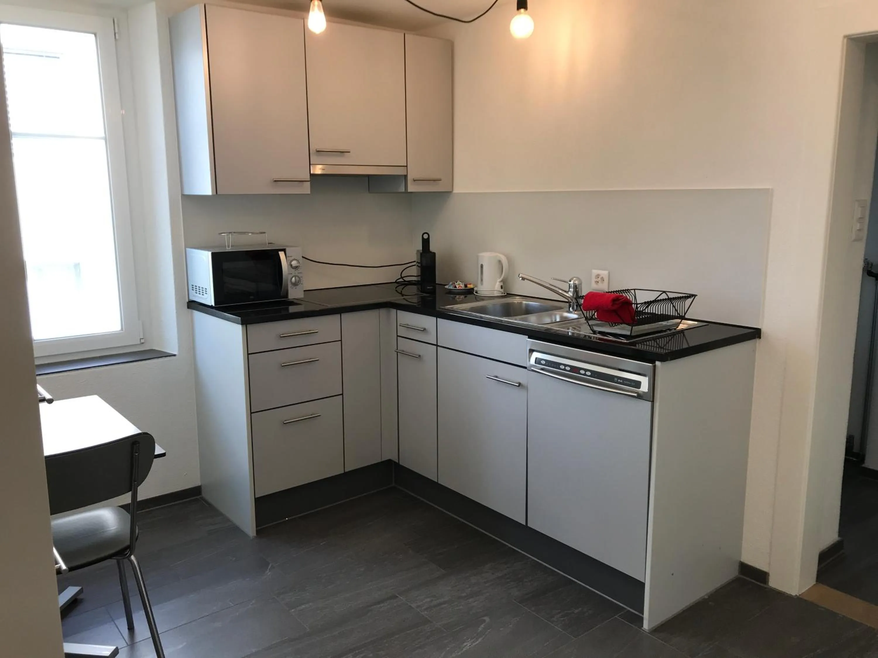 Kitchen or kitchenette in Hotel Tilia - Self Check-in