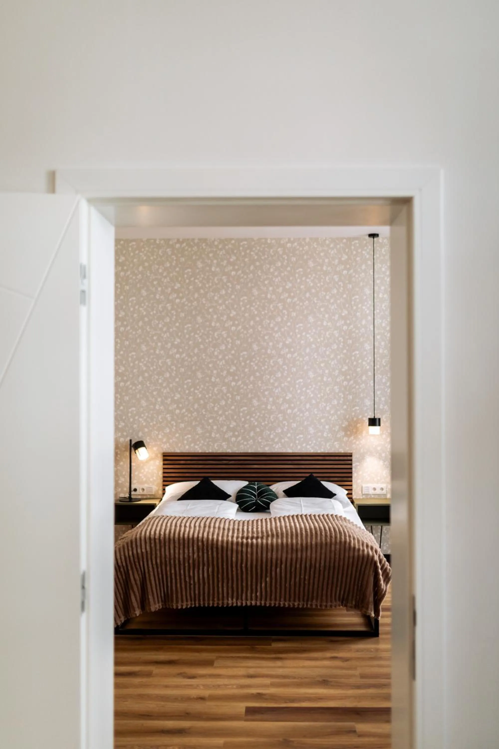 Bed in Urban Jungle Apartments