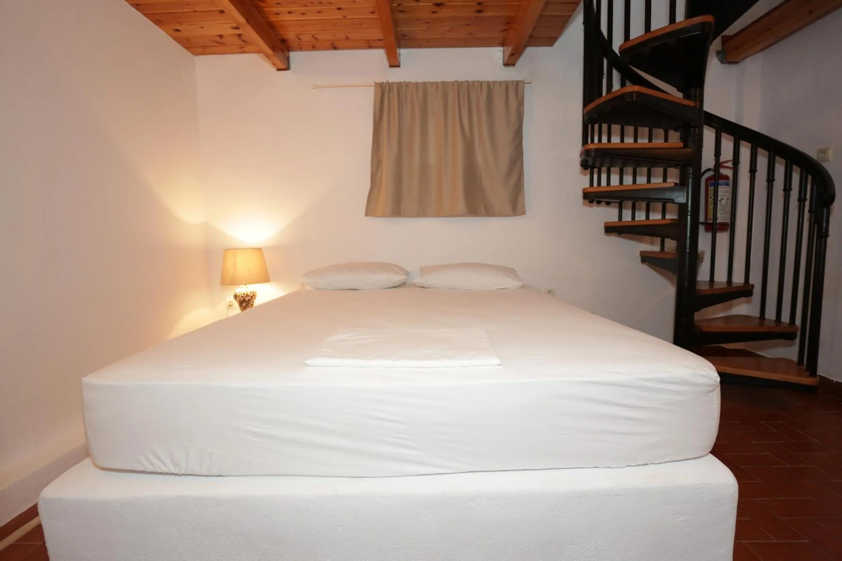 Bed in Artemis Suites