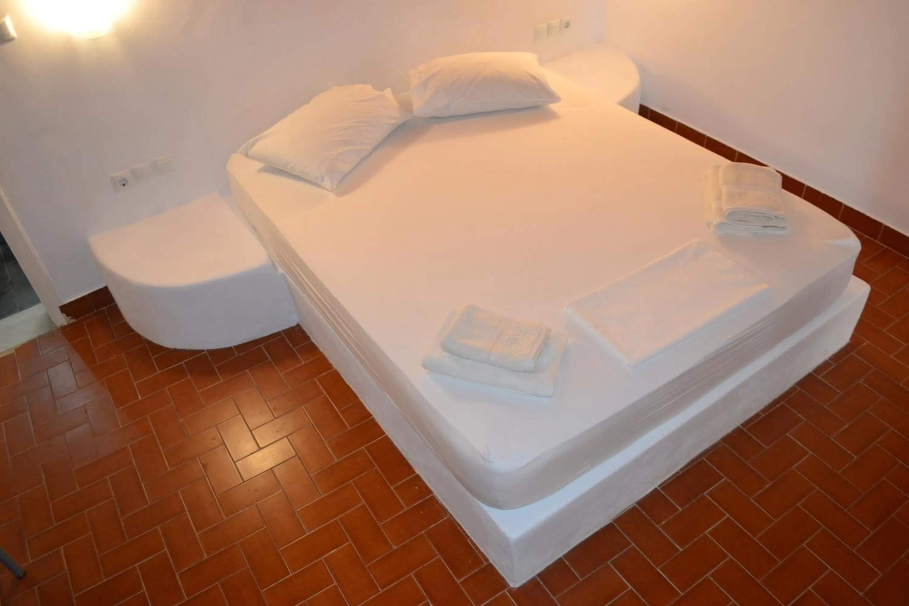 Bed in Artemis Suites