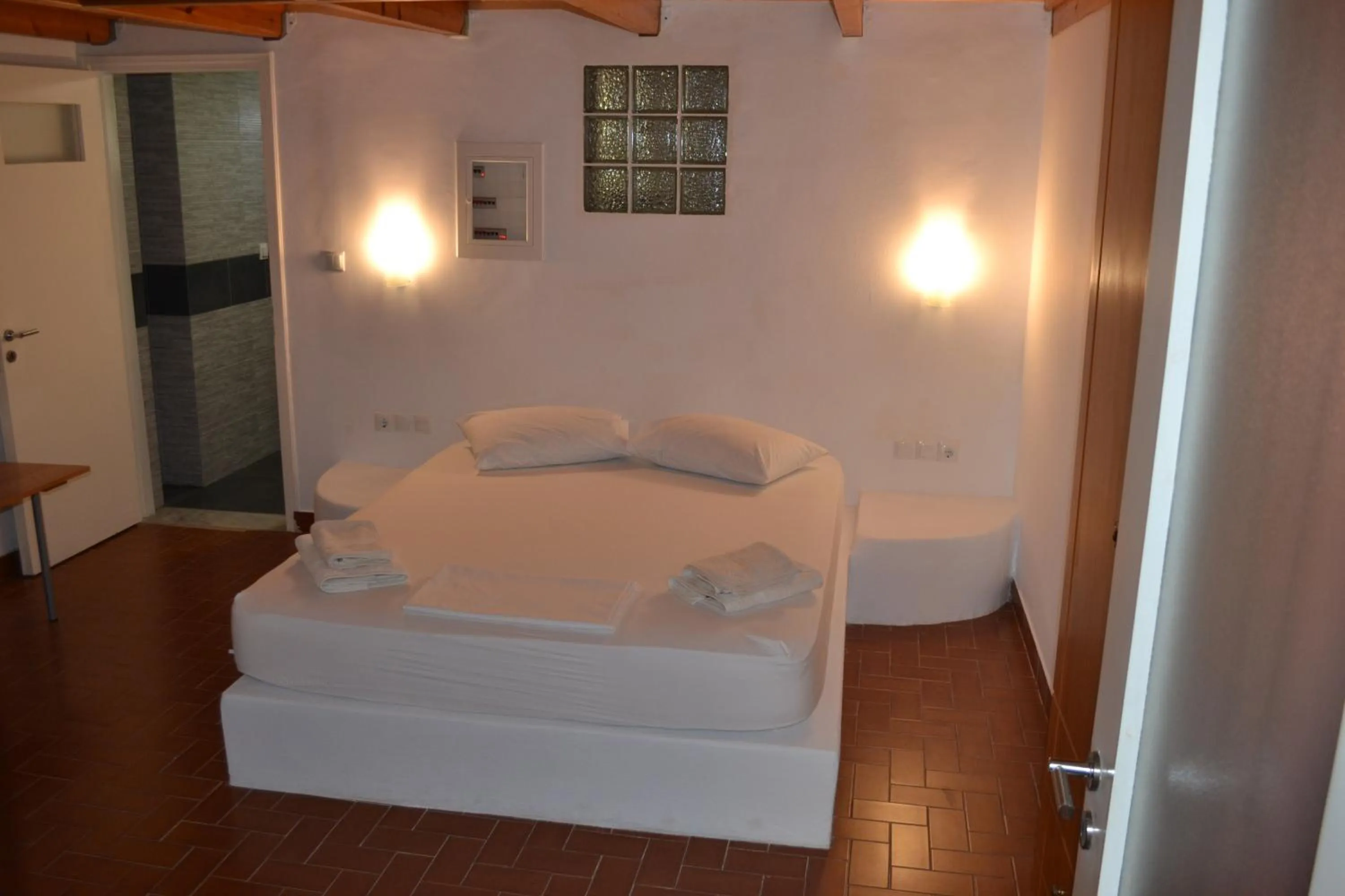 Bed in Artemis Suites