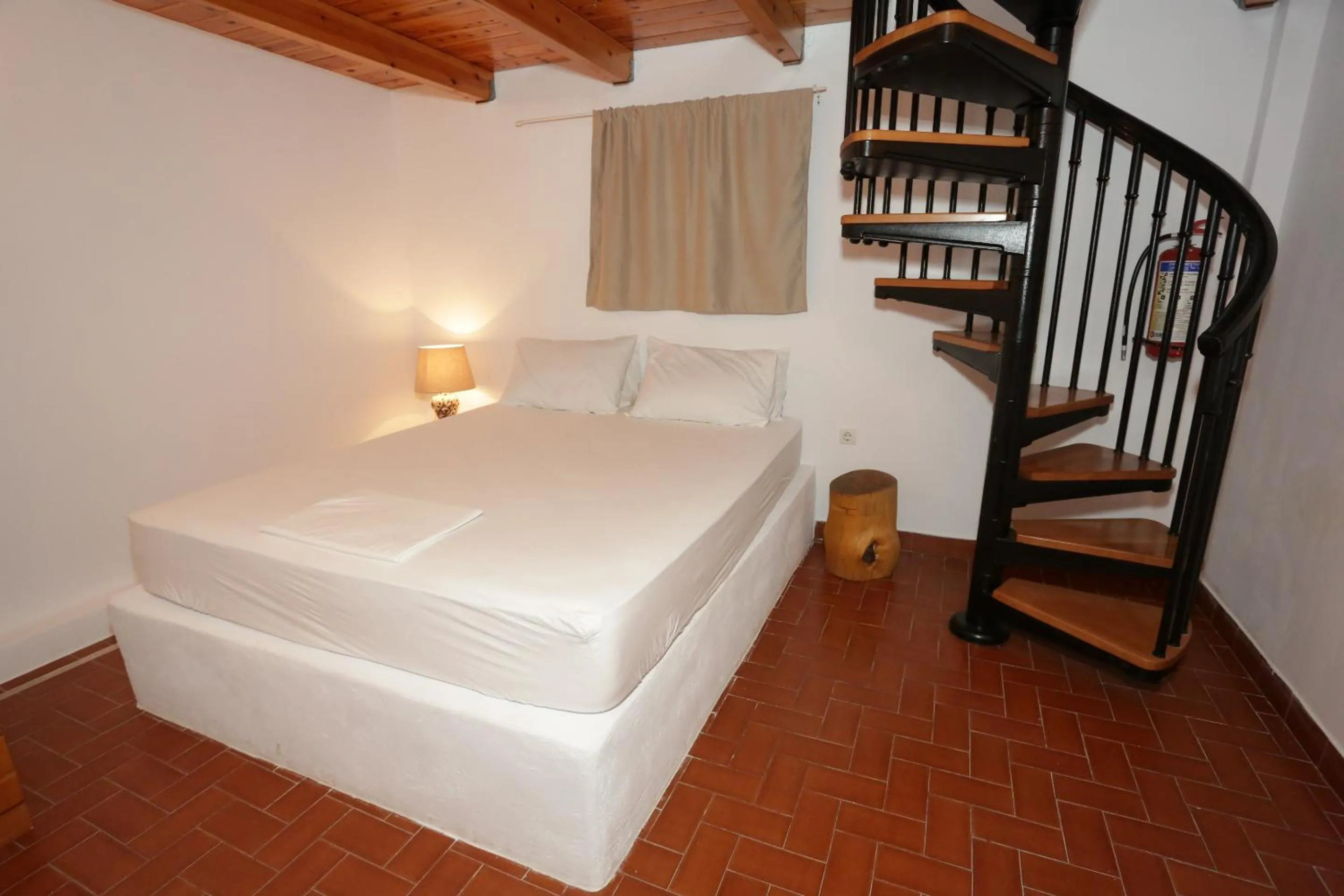 Bed in Artemis Suites