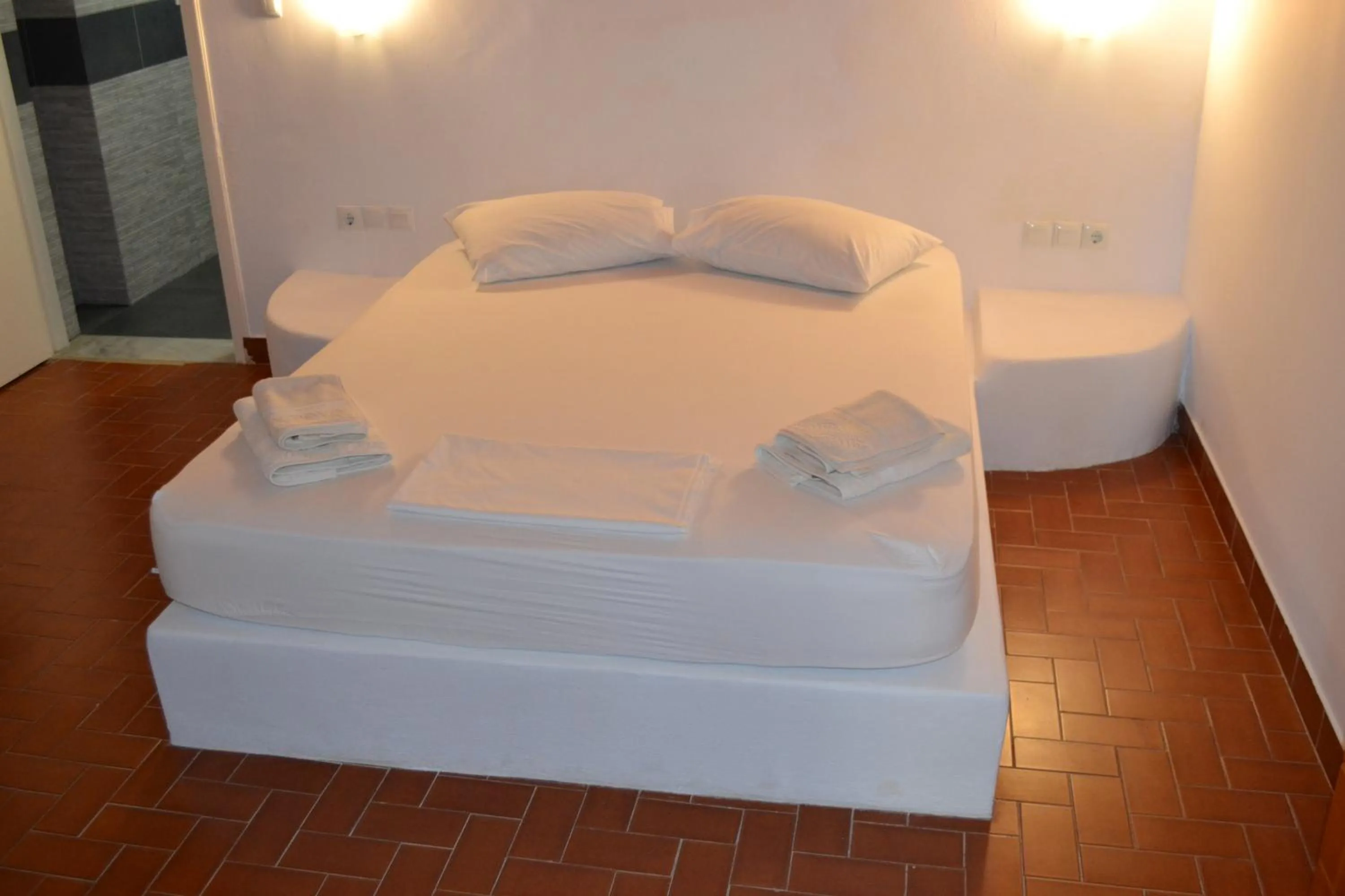 Bed in Artemis Suites