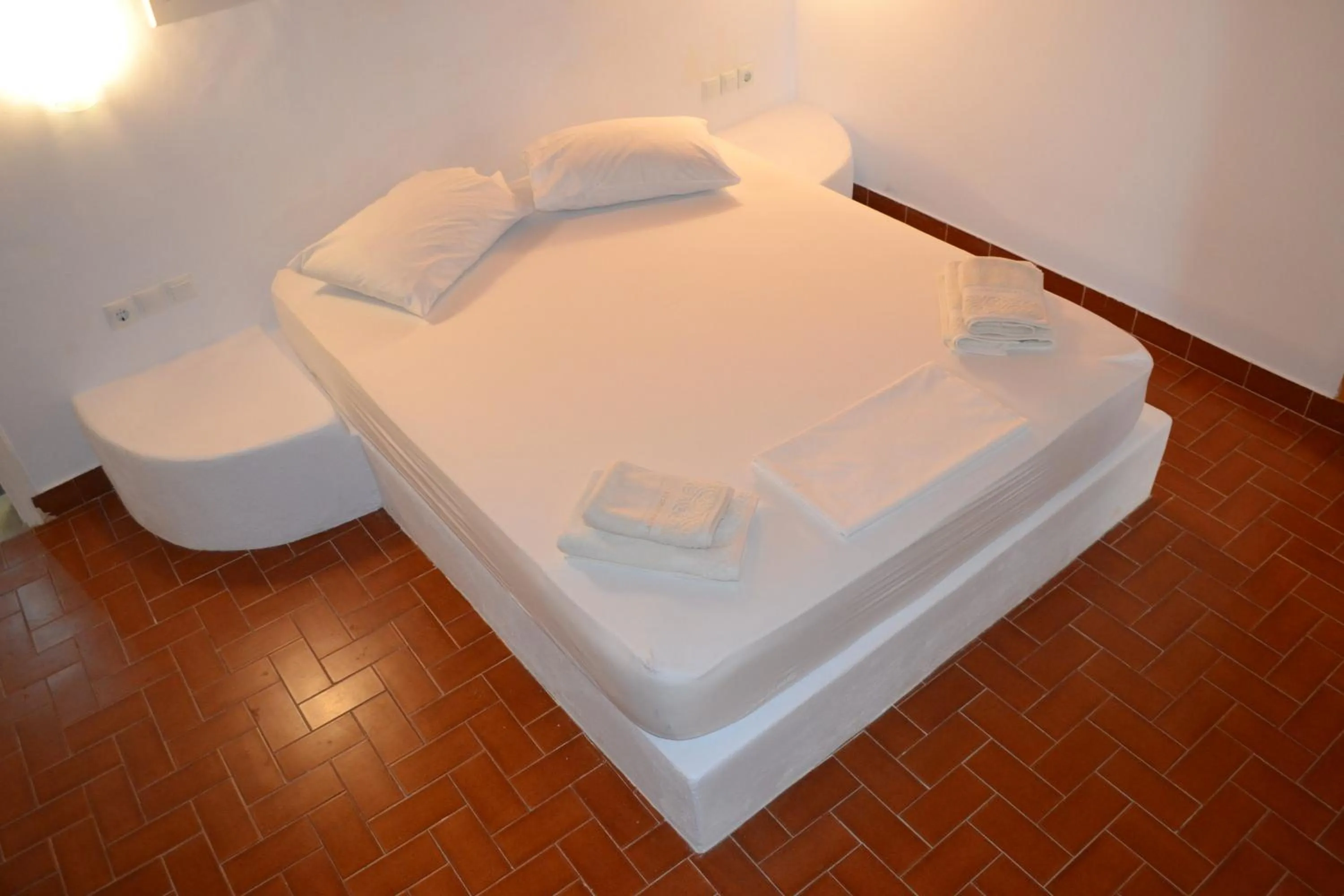 Bed in Artemis Suites