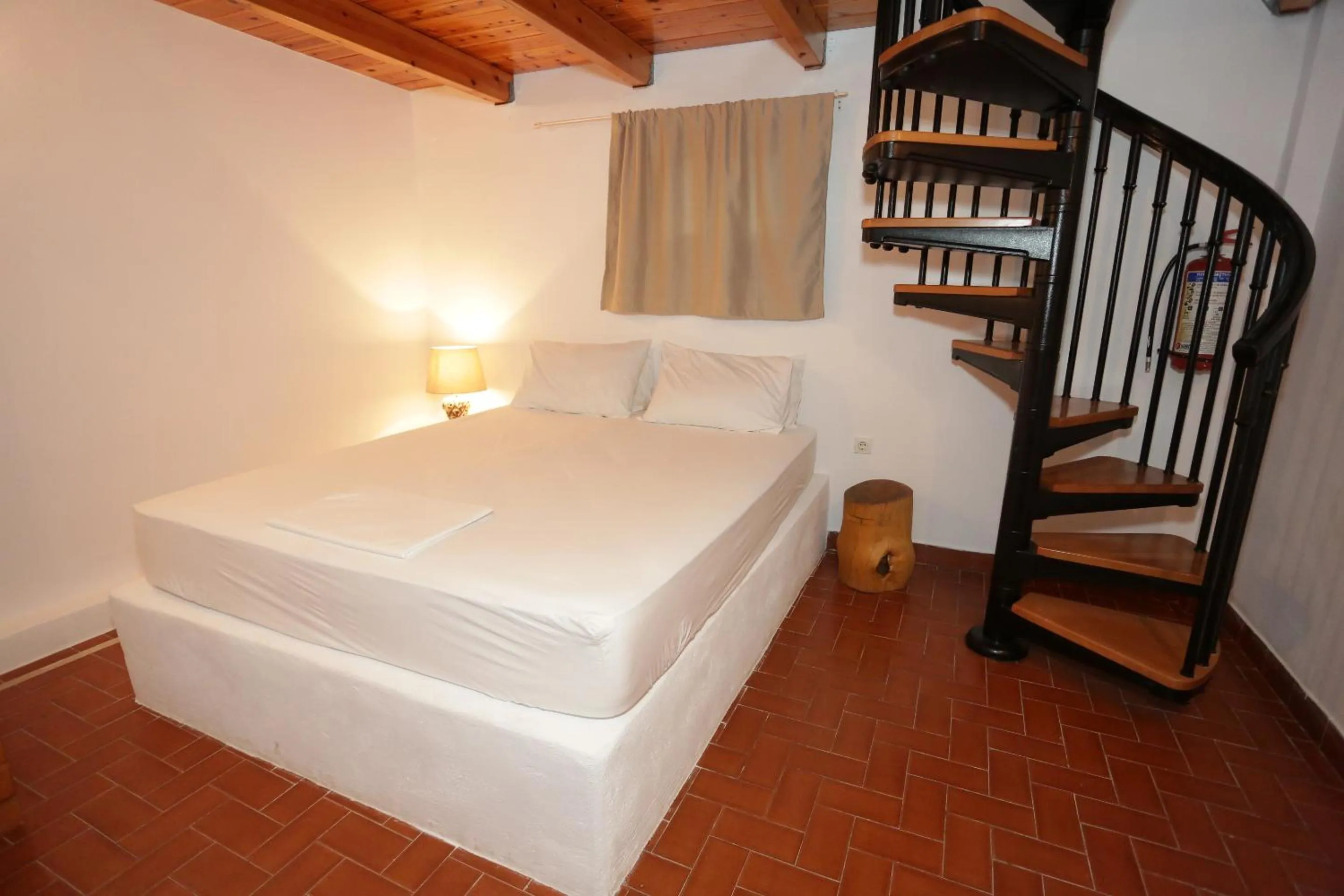 Bed in Artemis Suites