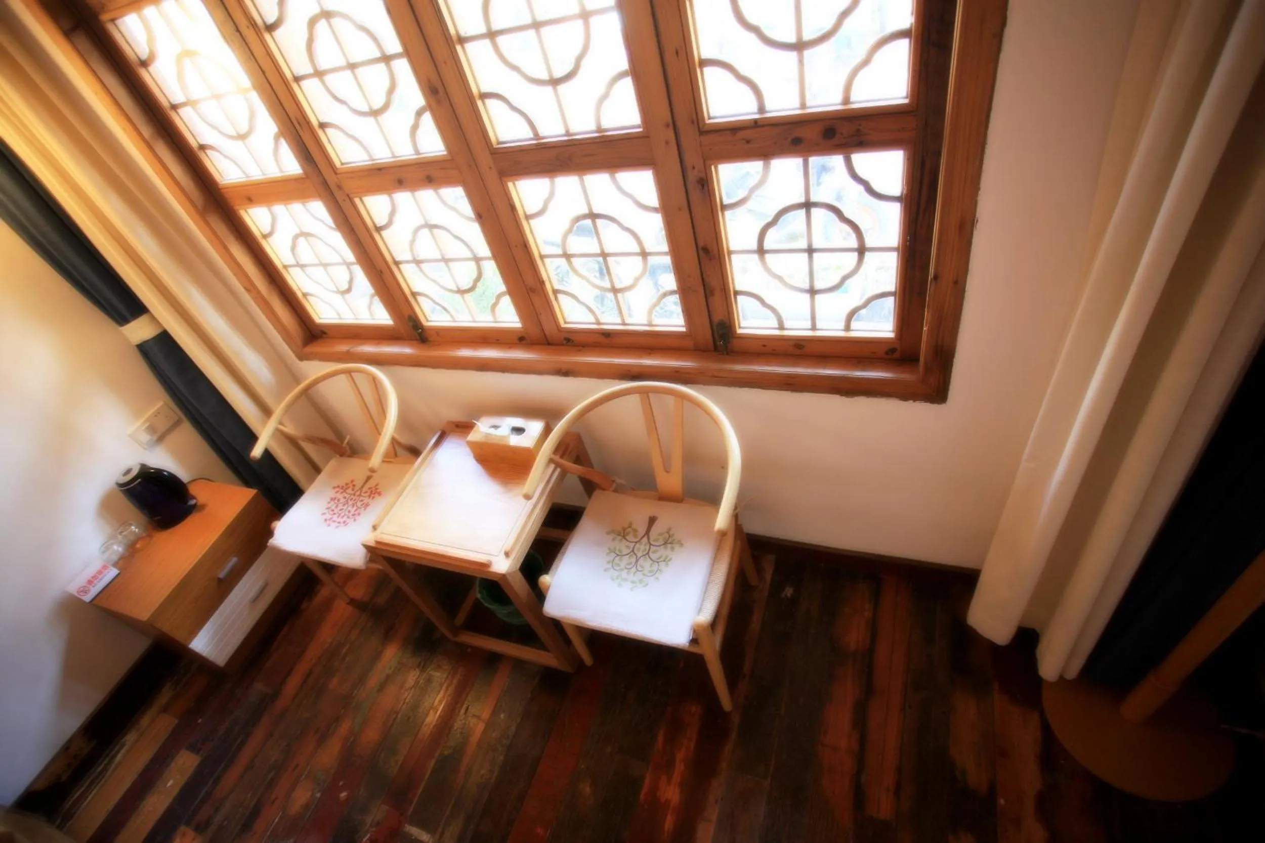Seating area in Tongli Begonia Flowers Guesthouse