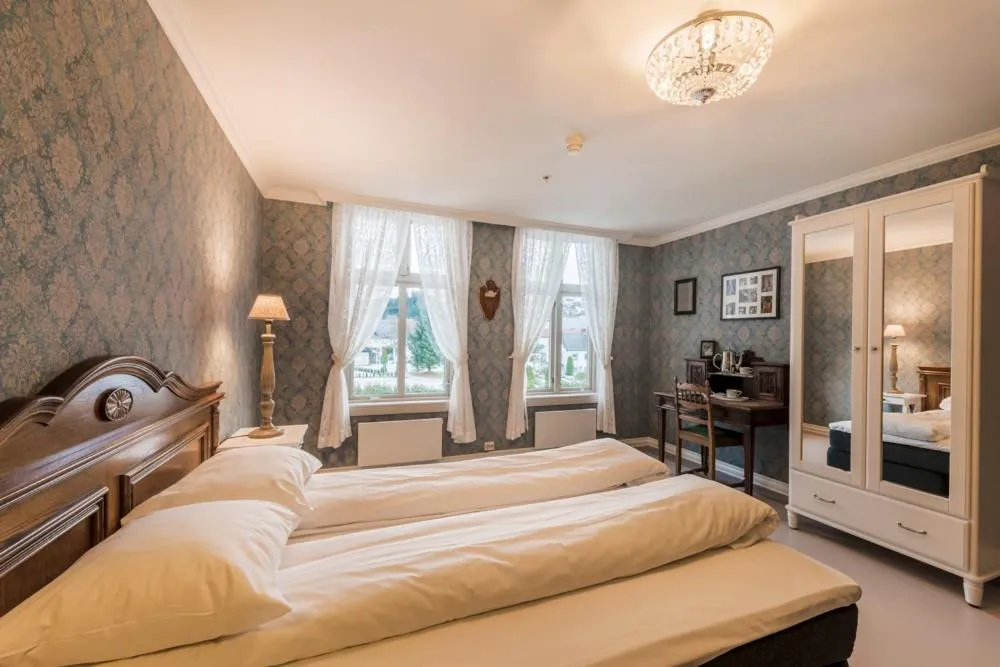 Photo of the whole room, Bed in Gloppen Hotell - by Classic Norway Hotels
