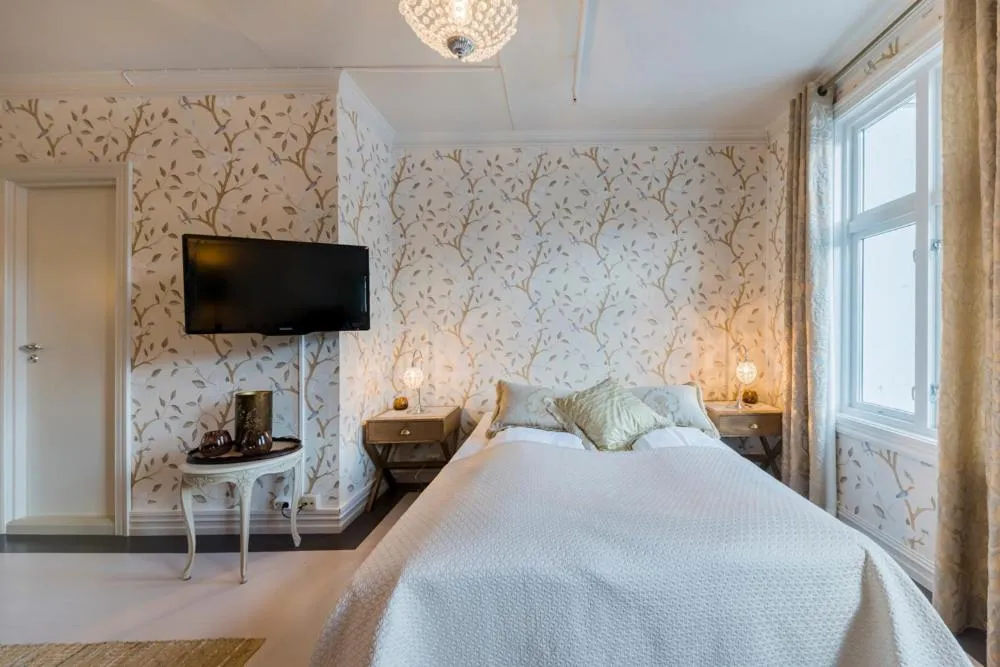 Photo of the whole room, Bed in Gloppen Hotell - by Classic Norway Hotels