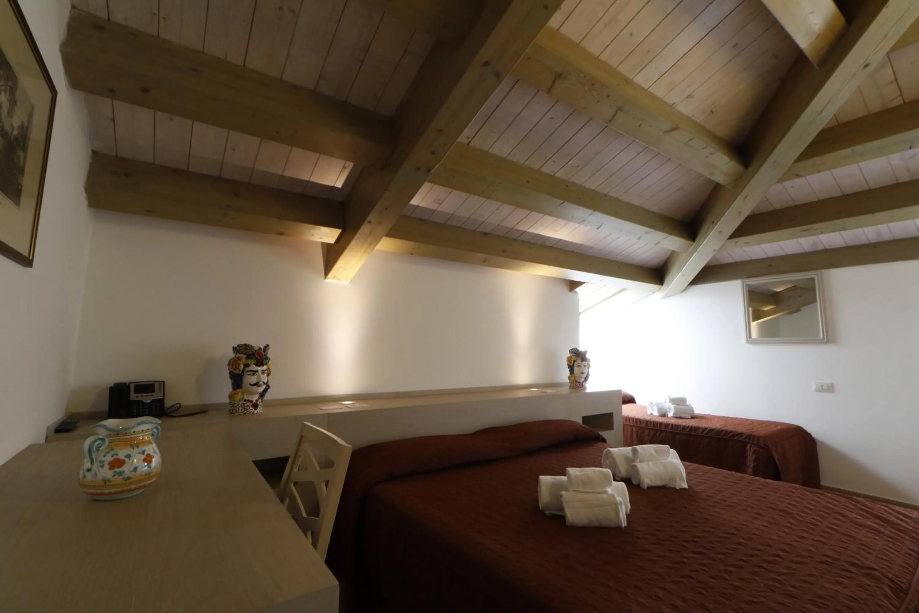 Bed in Hotel Villa Fanusa