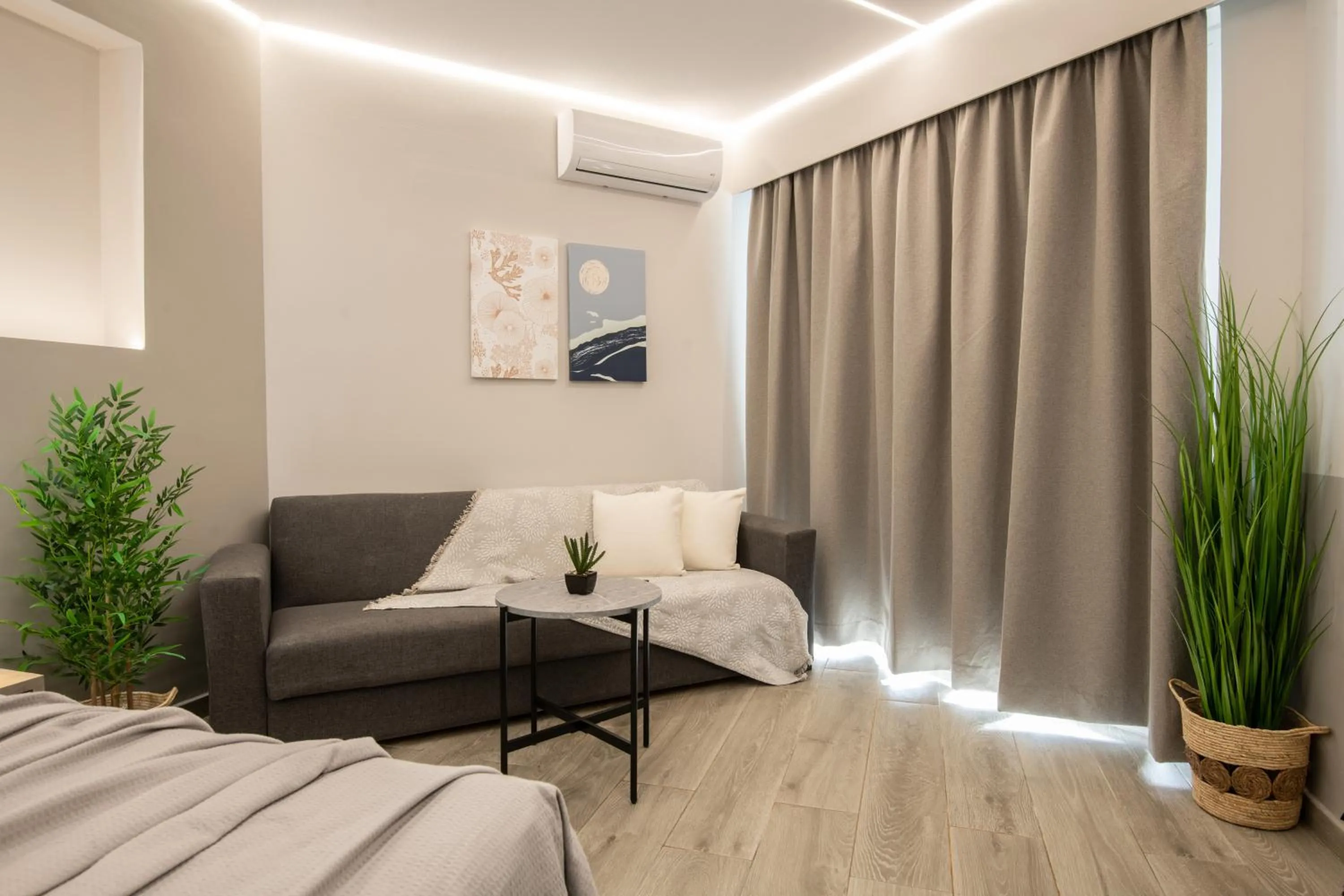 Seating area, Bed in Callinica Hotel