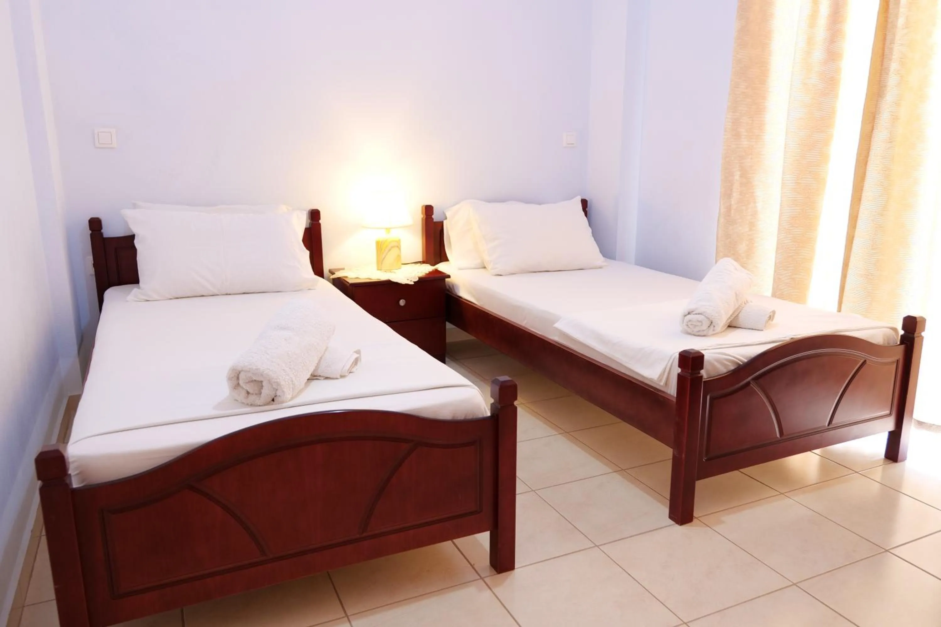 Bed in Miracle Apartments Saranda