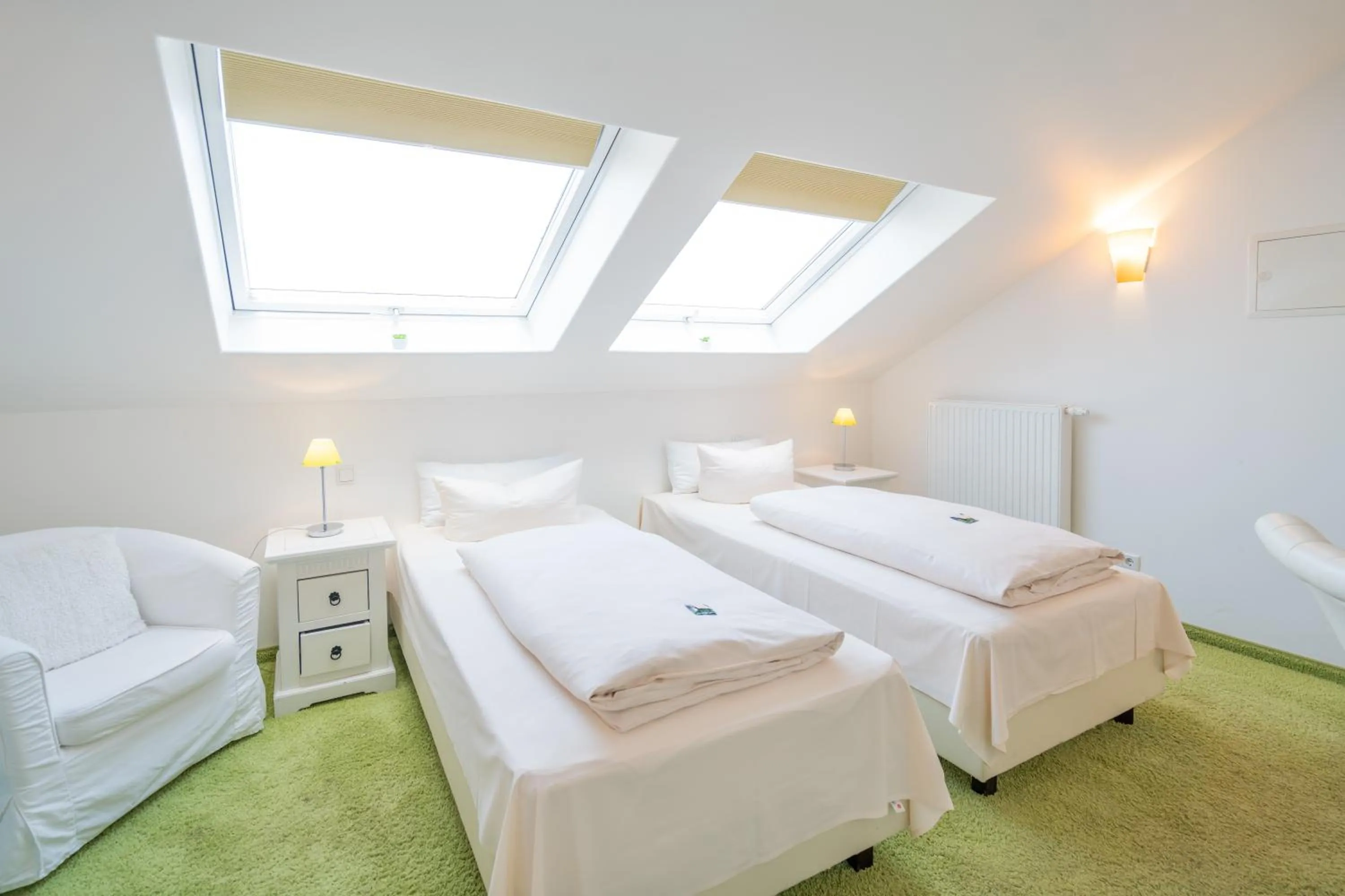 Photo of the whole room, Bed in Landhaus Hotel Wolfratshausen