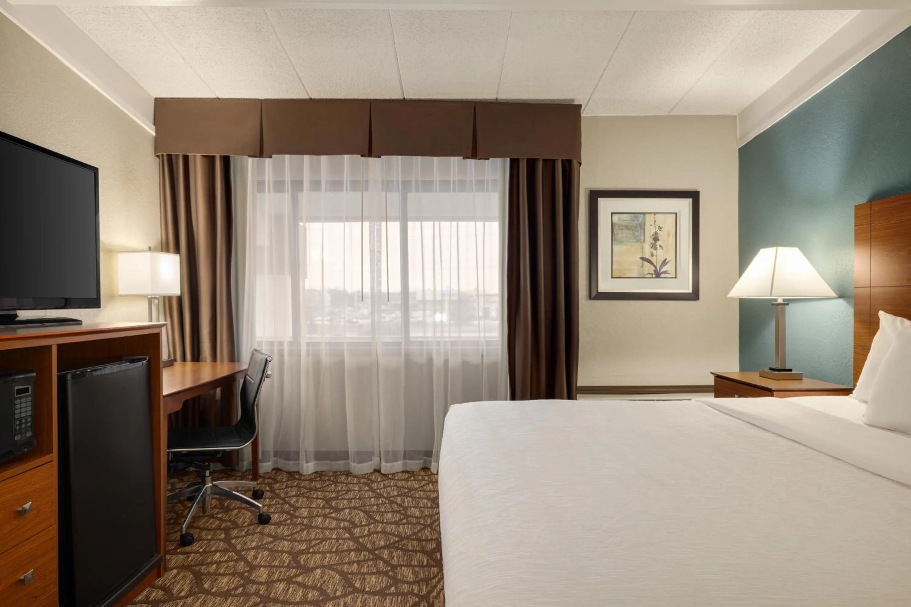 Bedroom, Bed in AmericInn by Wyndham Grand Rapids Airport North