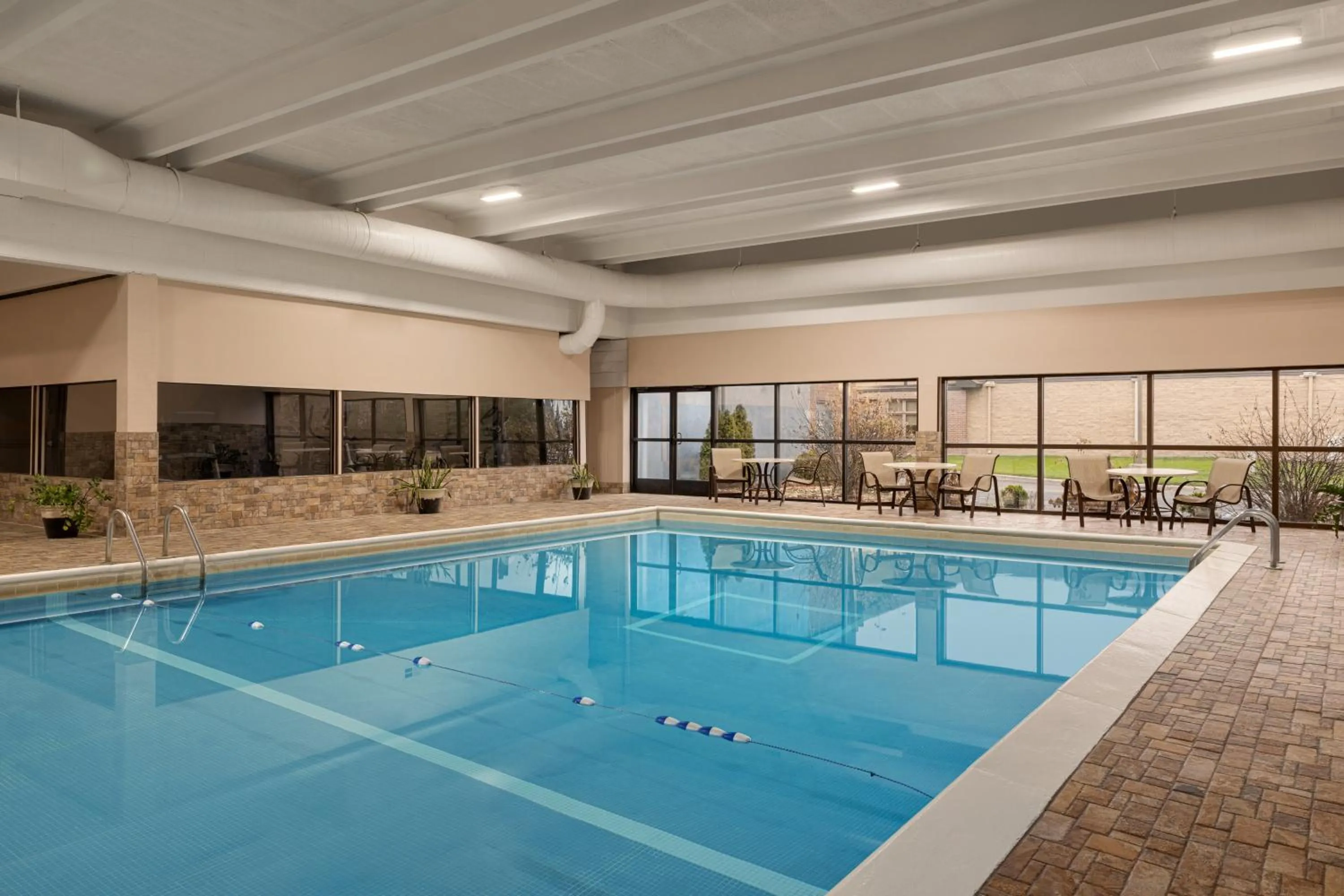 Swimming pool in AmericInn by Wyndham Grand Rapids Airport North
