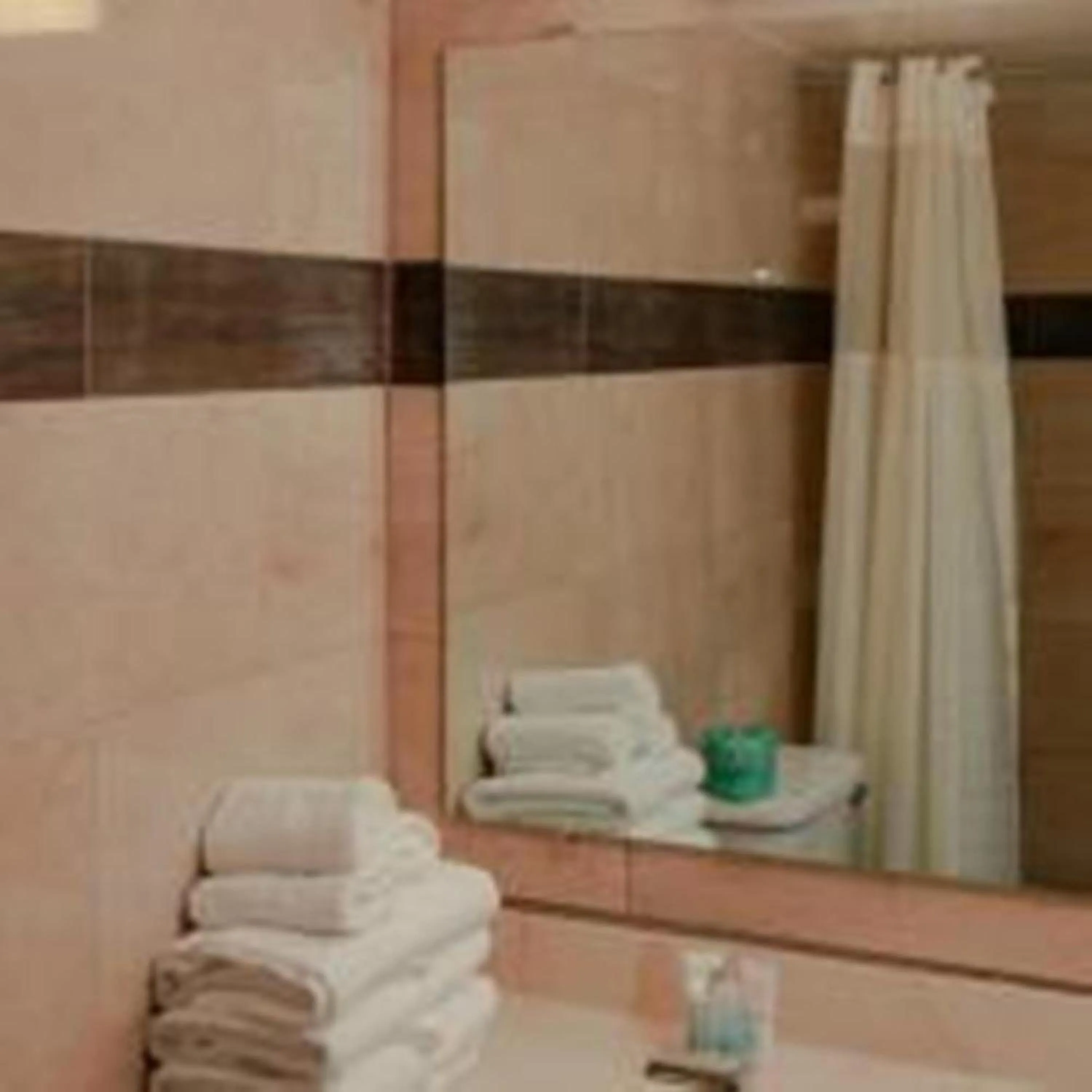 Bathroom in SureStay Hotel by Best Western Seaside Monterey