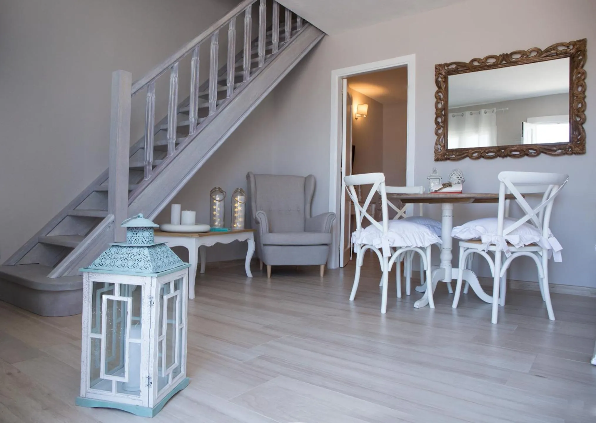 Communal lounge/ TV room in Le Saline Suites