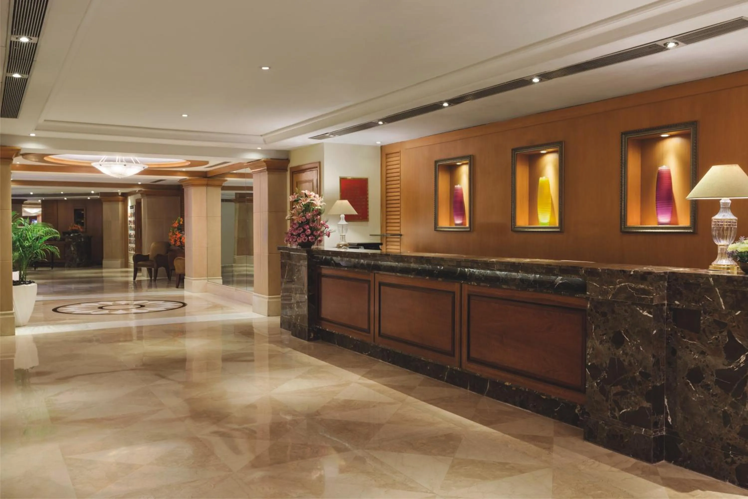 Lobby or reception in Ramada Plaza By Wyndham Palm Grove