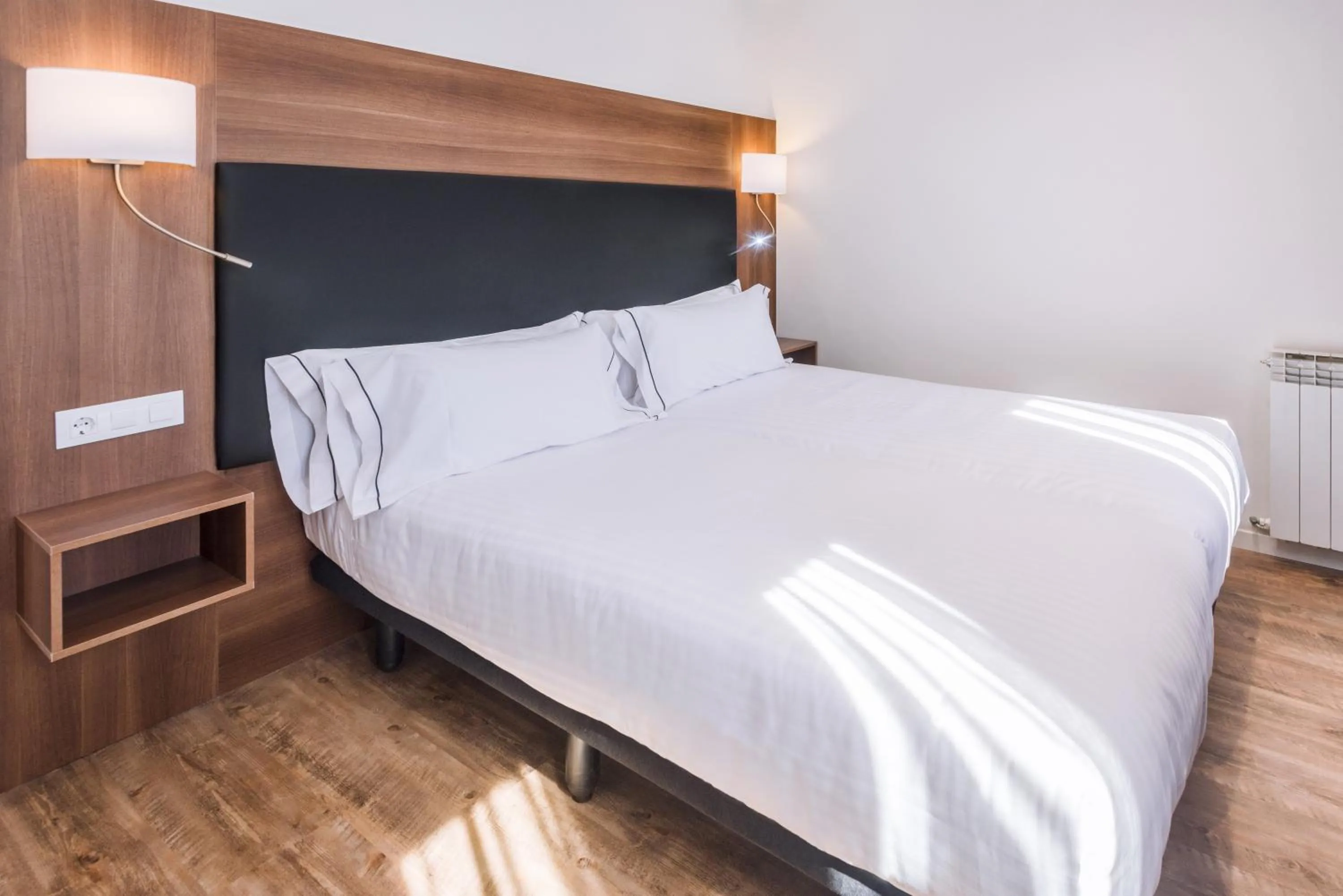 Bed in Apartments Playa de Castelldefels