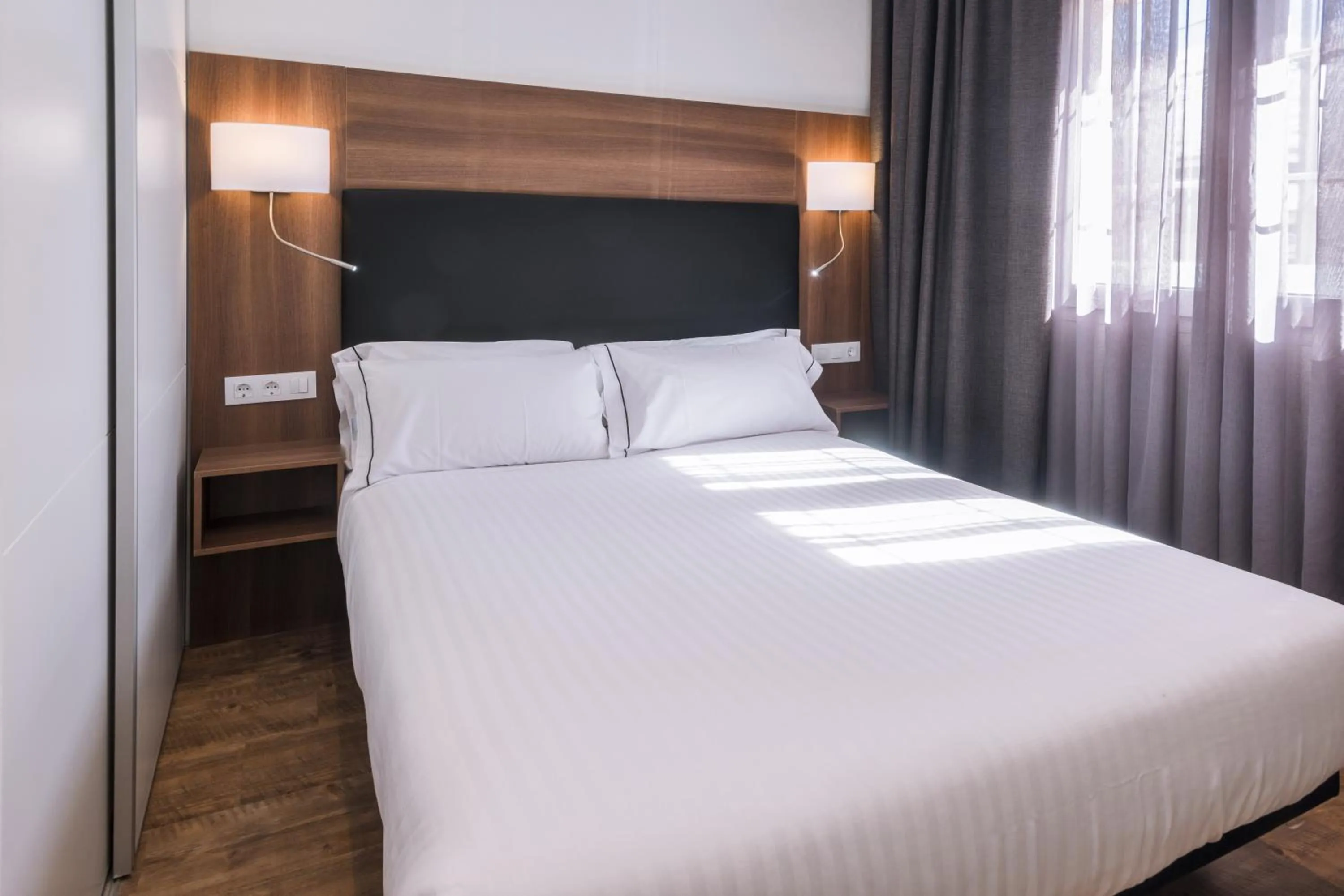 Bed in Apartments Playa de Castelldefels