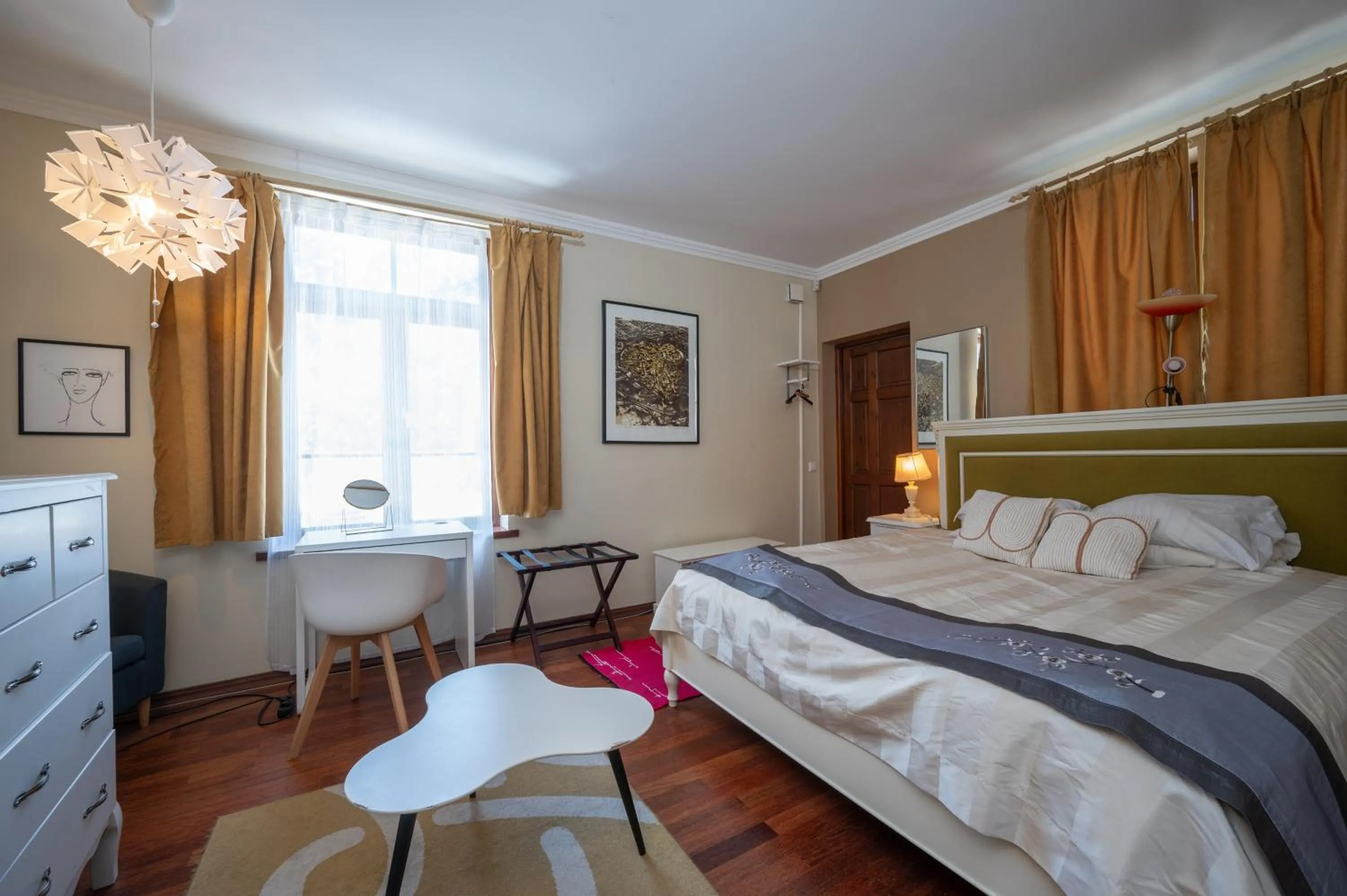 Bed in Paivilla Boutique Hotel