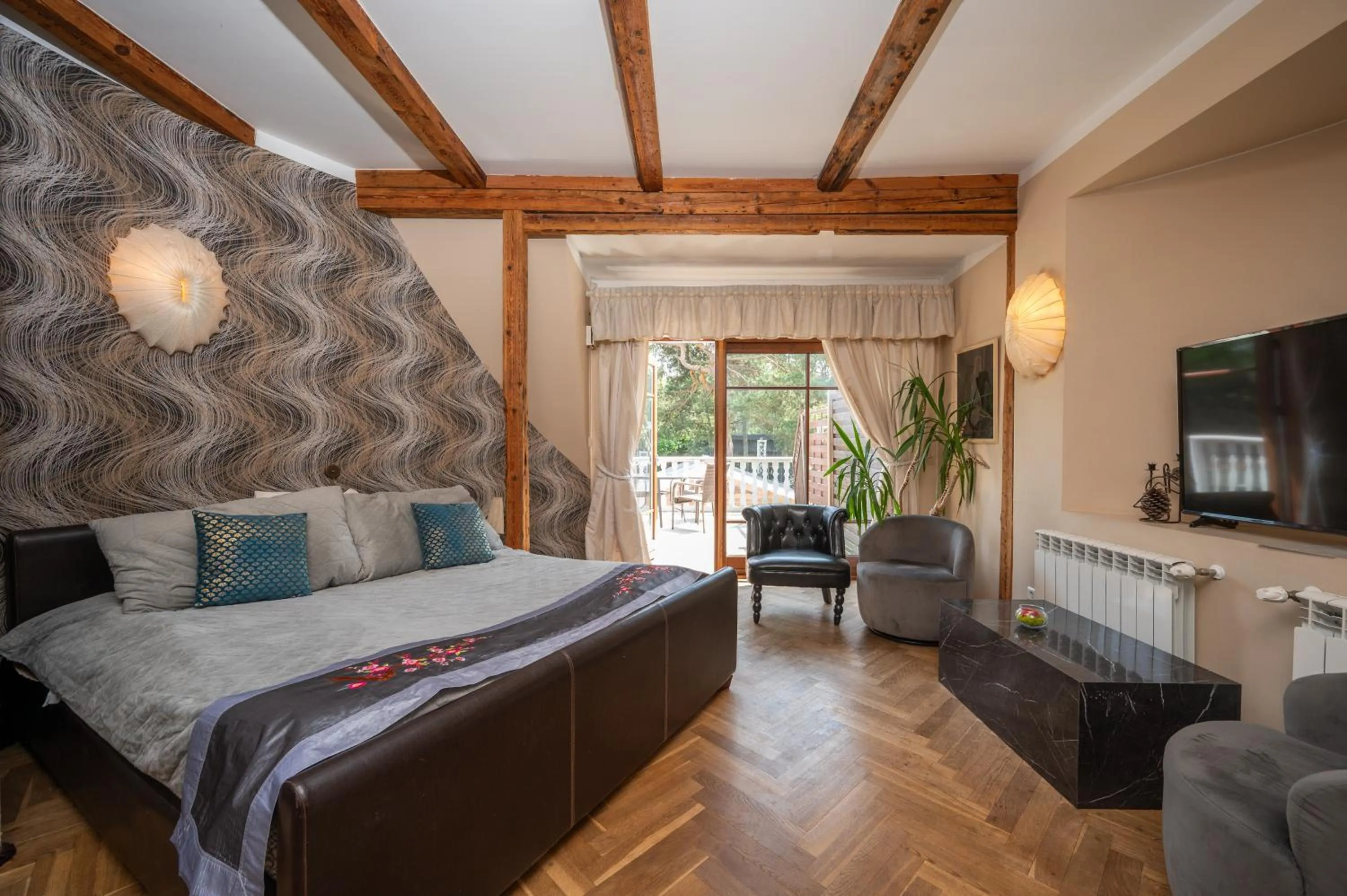 Bed in Paivilla Boutique Hotel