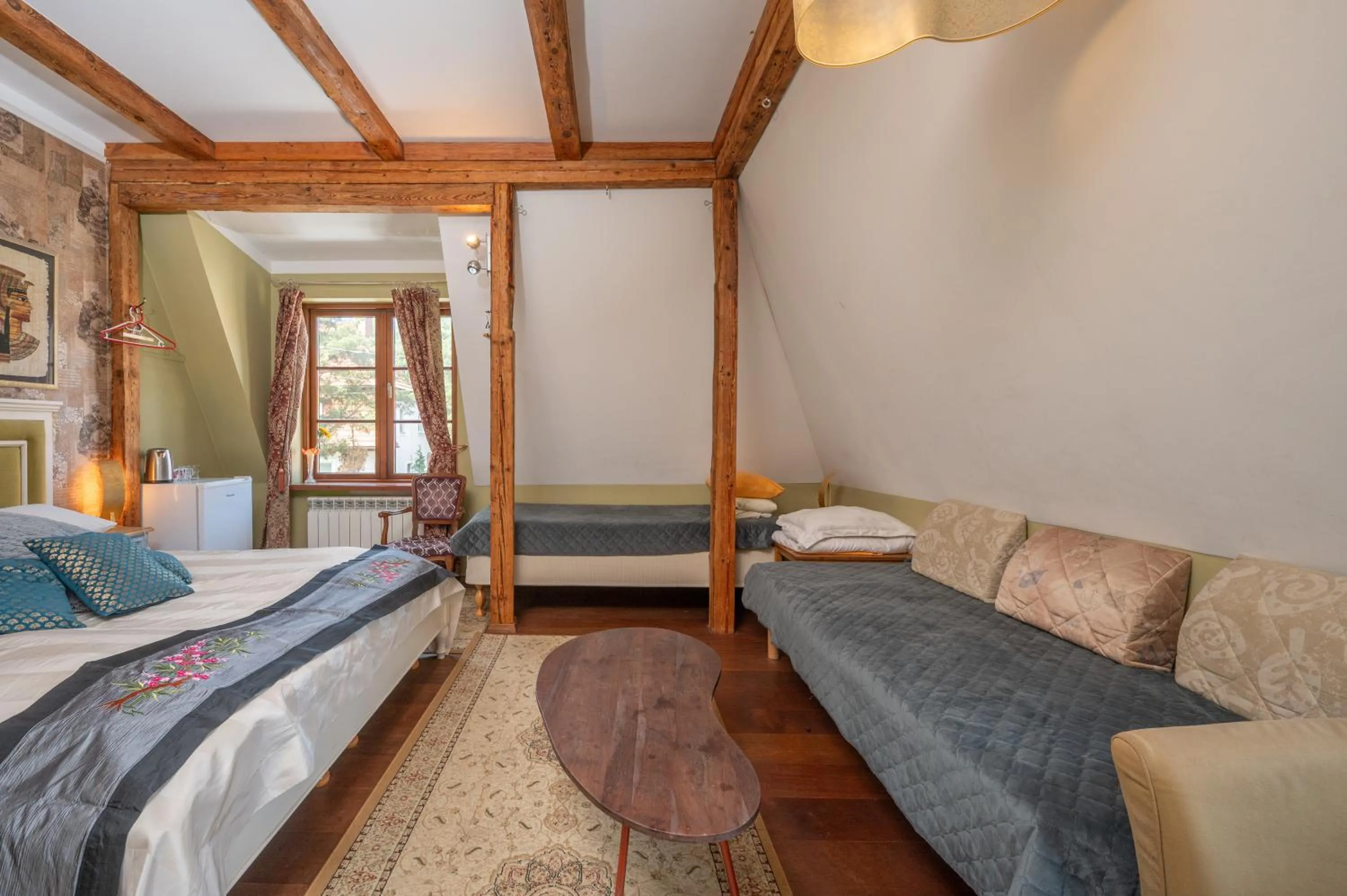 Bed in Paivilla Boutique Hotel