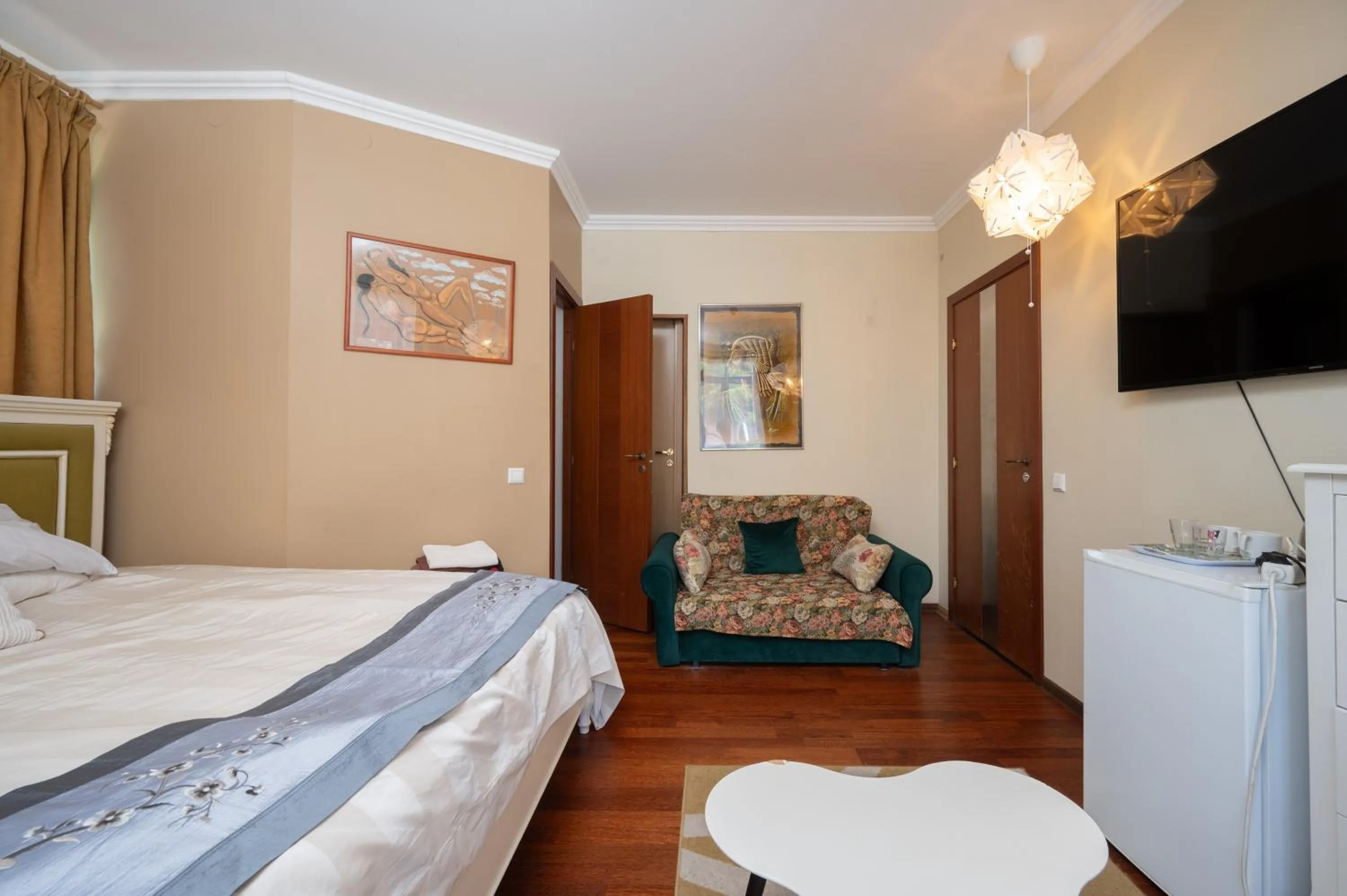 Bed in Paivilla Boutique Hotel