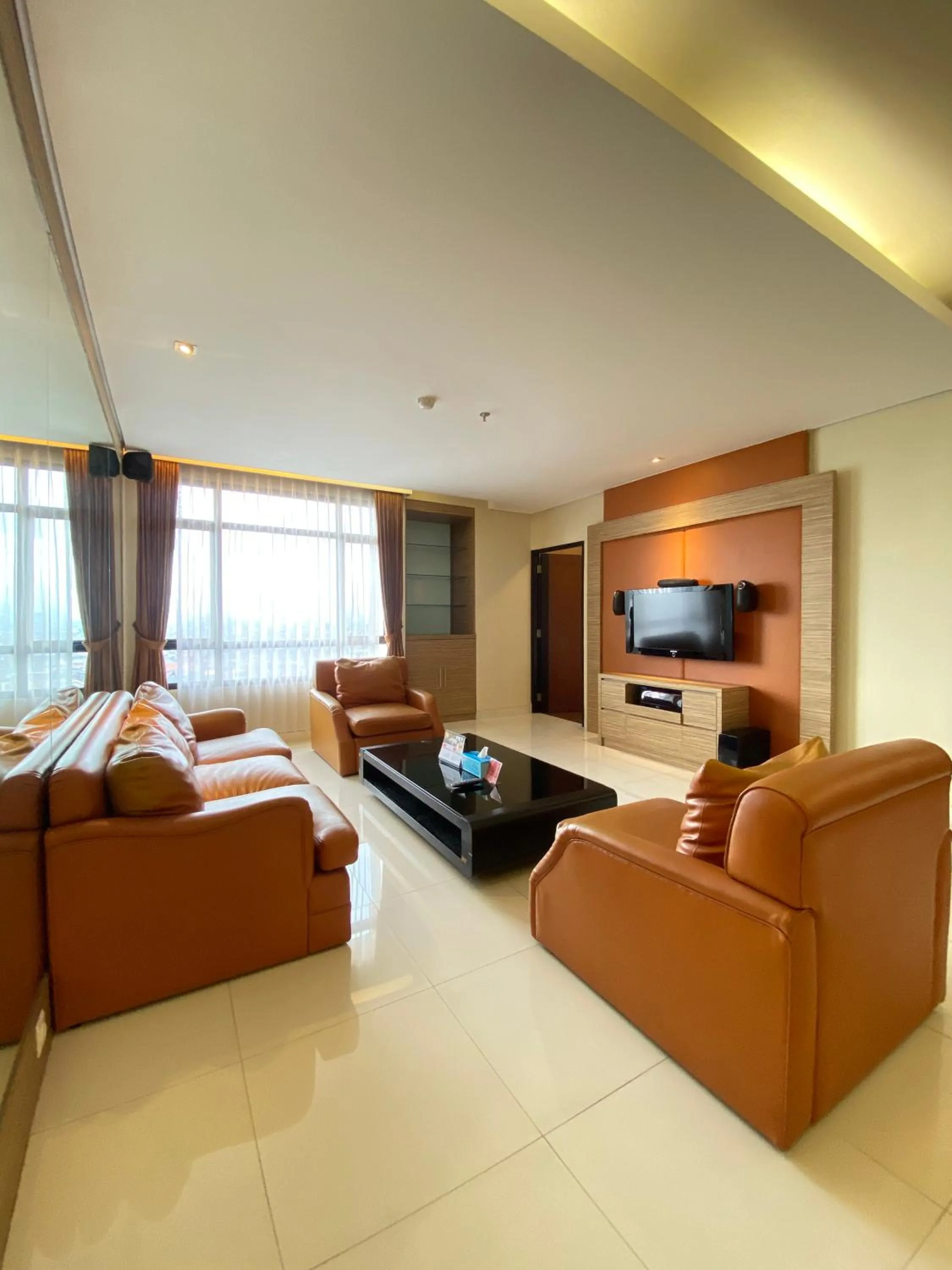 Living room in Grand Pasundan Convention Hotel