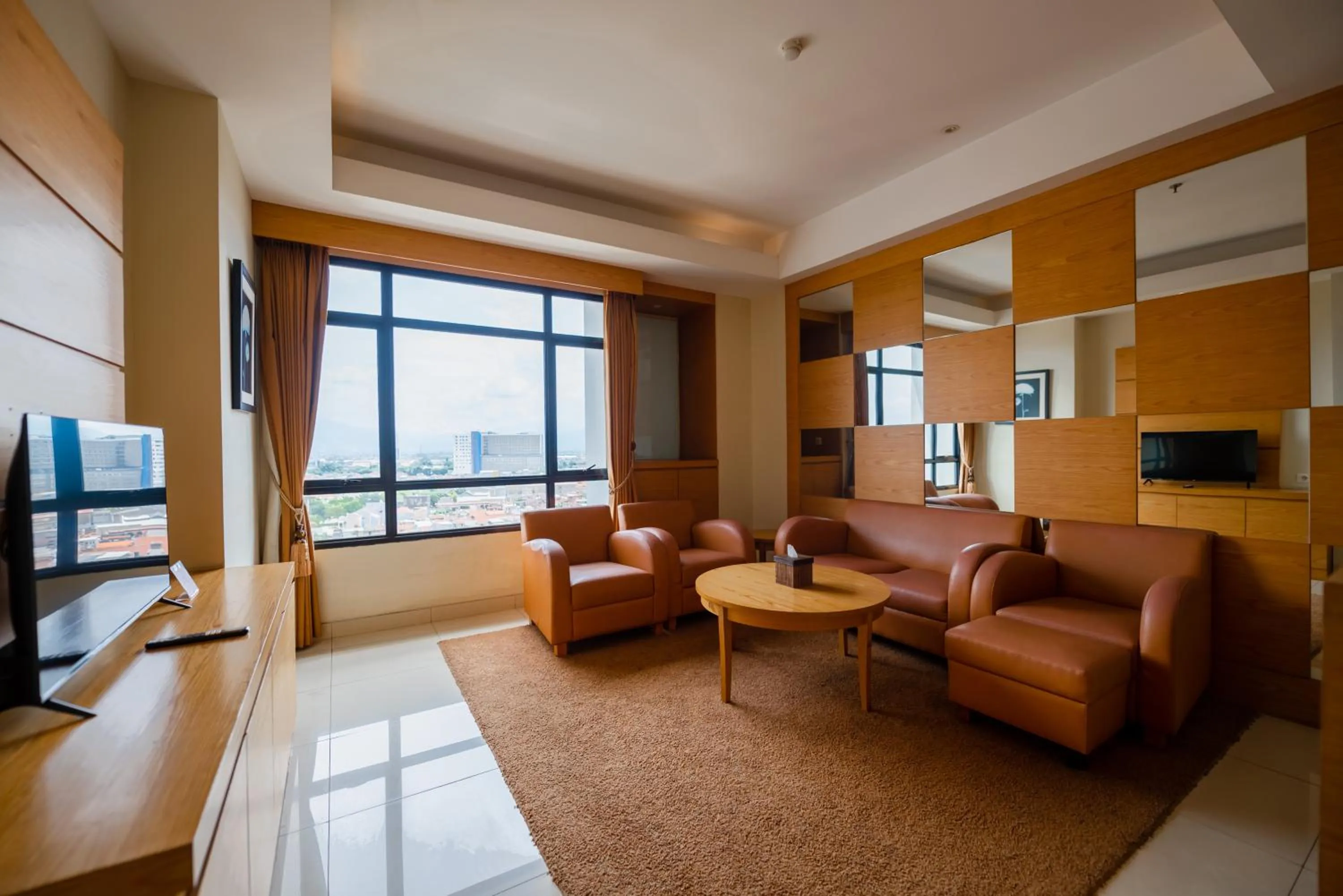 Living room in Grand Pasundan Convention Hotel